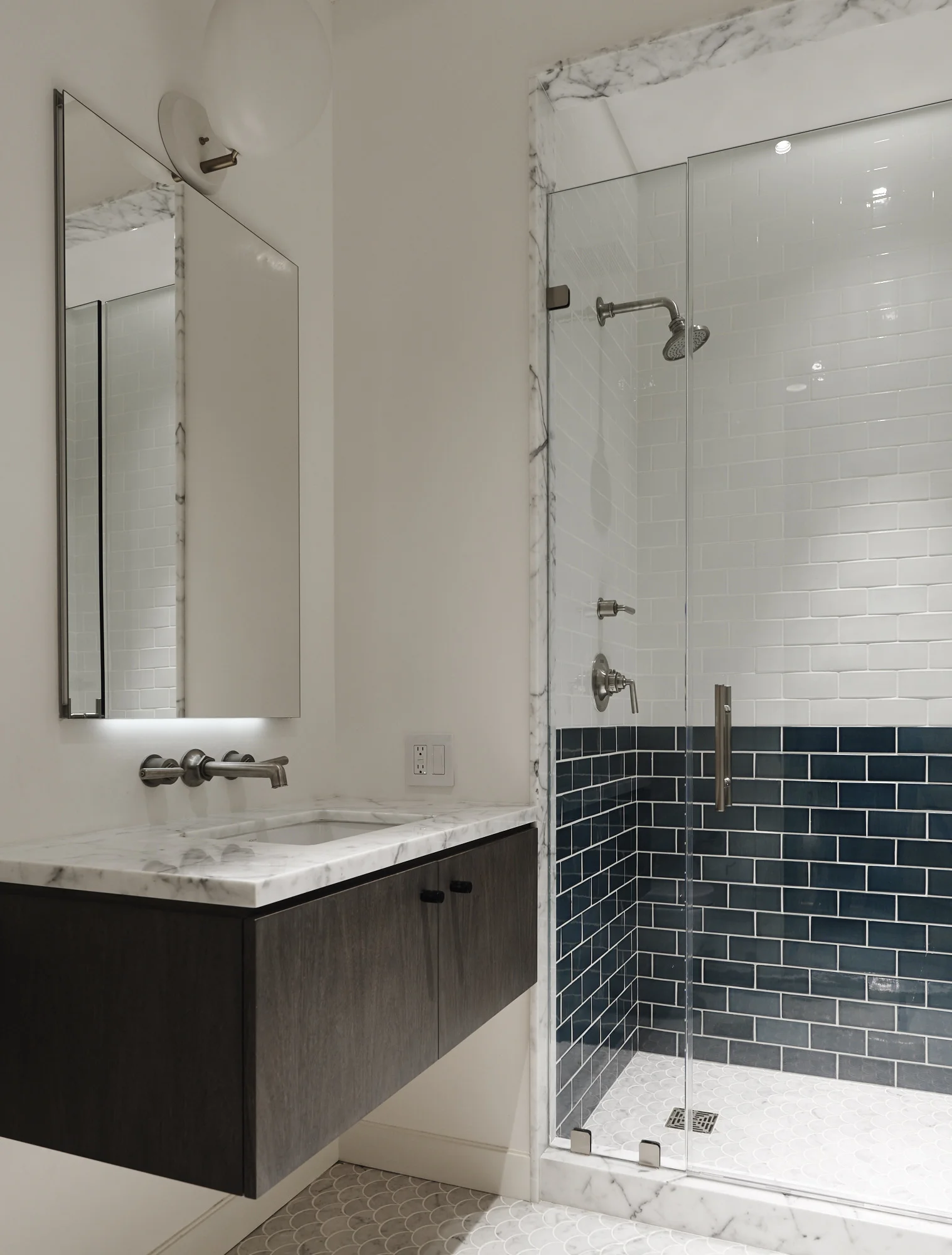Modern Soho loft bathroom renovation minimal white and blue tile