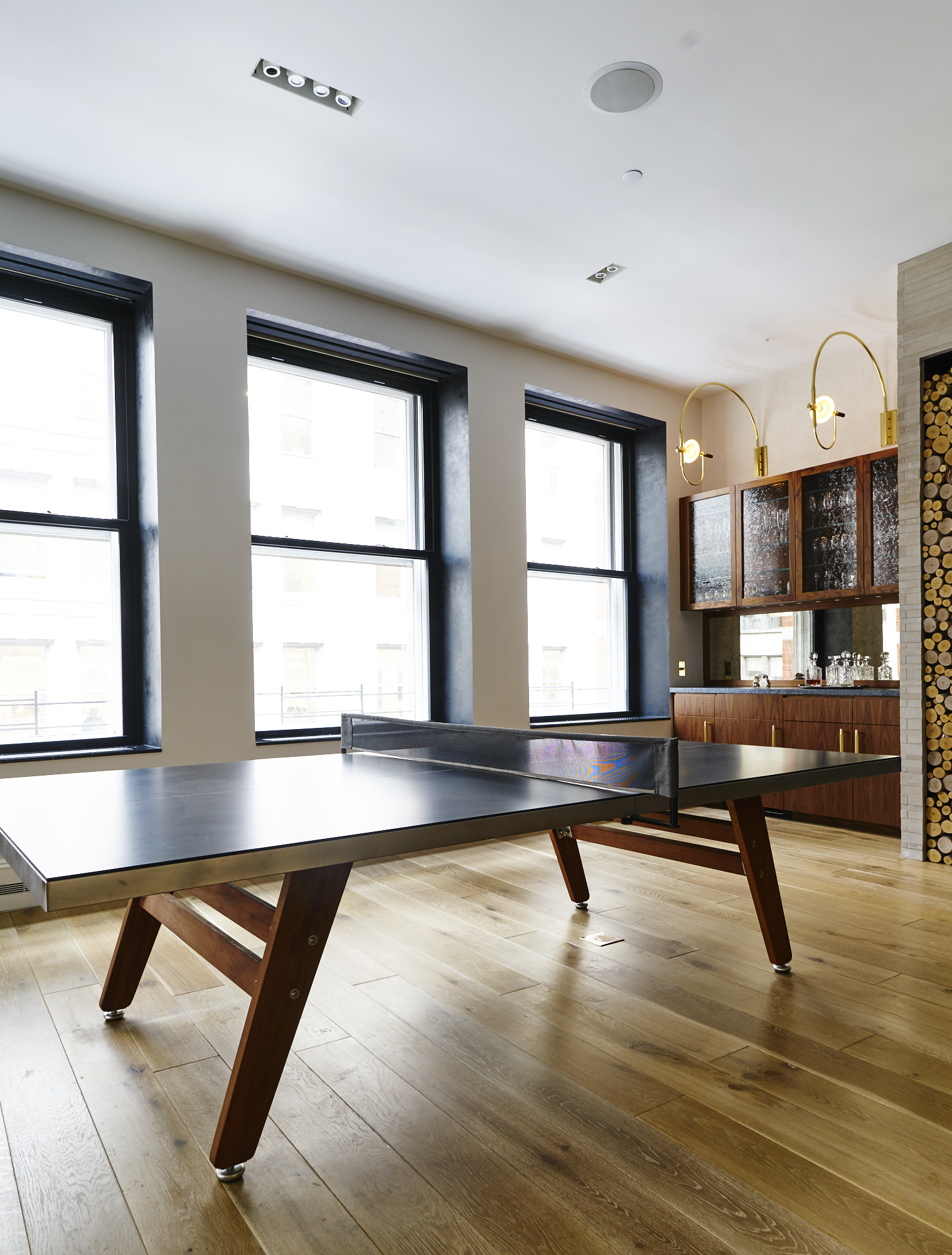 Modern Soho loft renovation pool table and dry bar