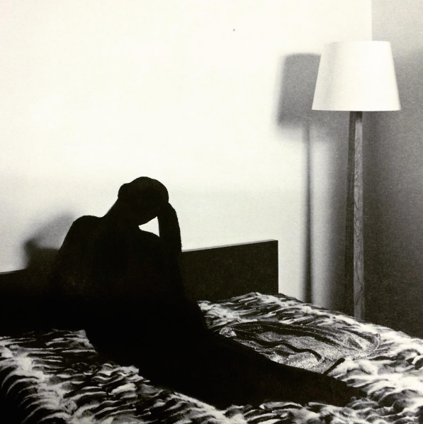 Girl on a Bed, marker on magazine