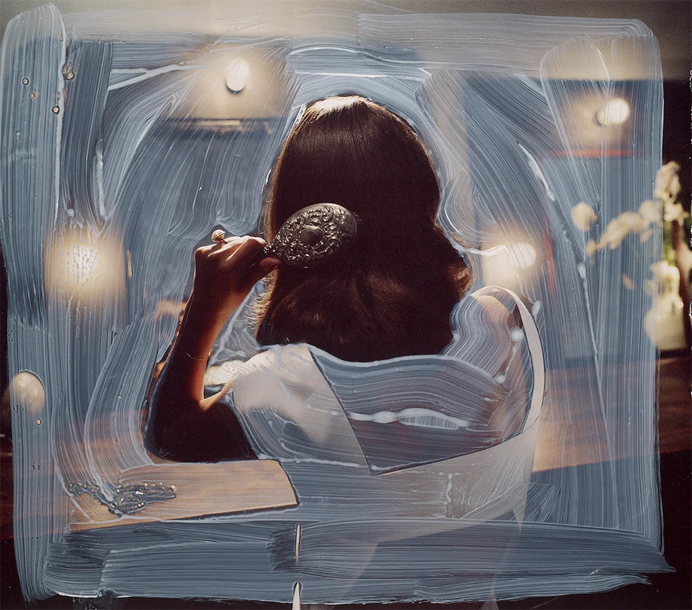 Woman Brushing Her Hair, latex on magazine