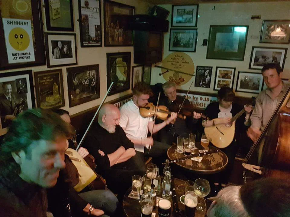 Comedian John Bishop enjoying a lively session in Matt Molloy's music room