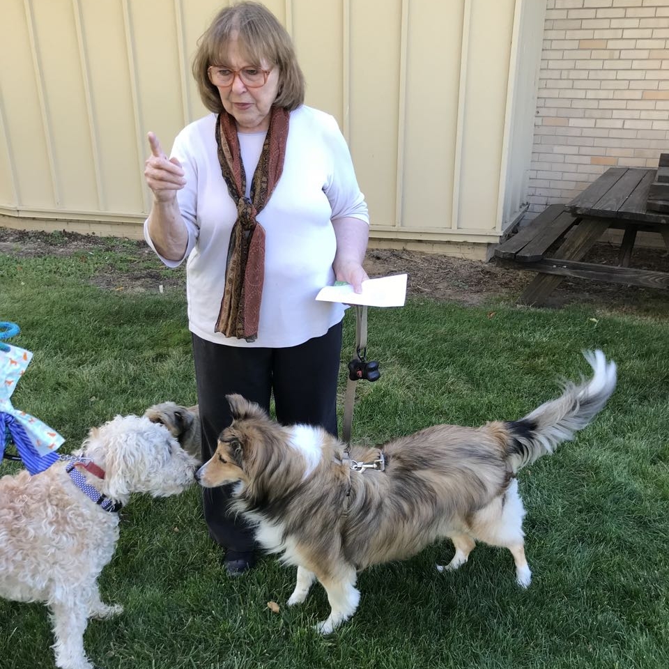 Gretchen Timmer, Maddie and Cash at pet blessing 2017.jpg