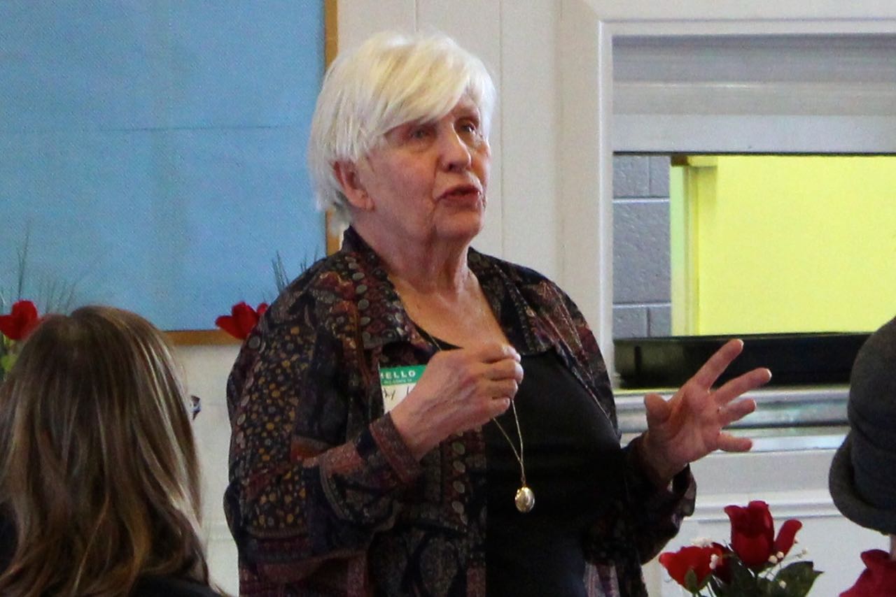 Cathy Loomis delivers Heritage Room report.jpg