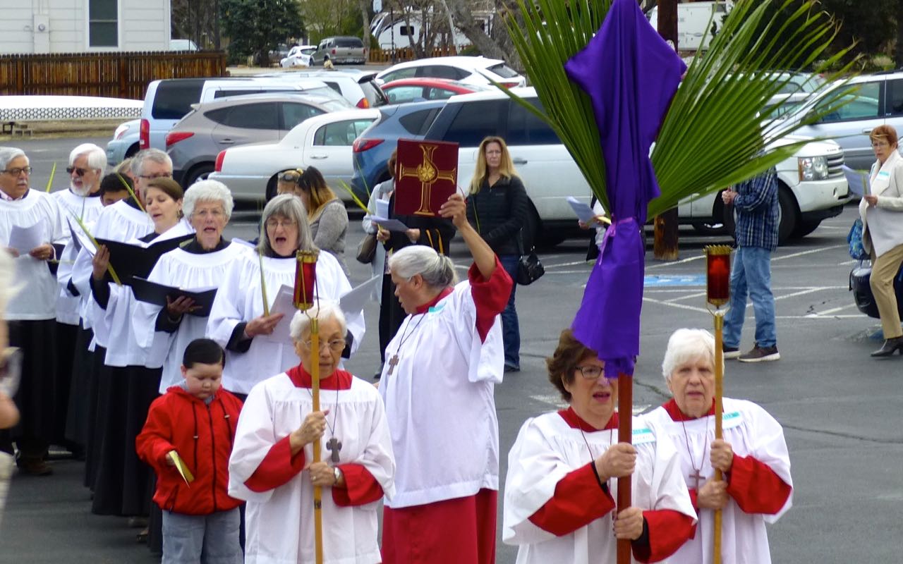 Palm procession heading toward front door.jpg