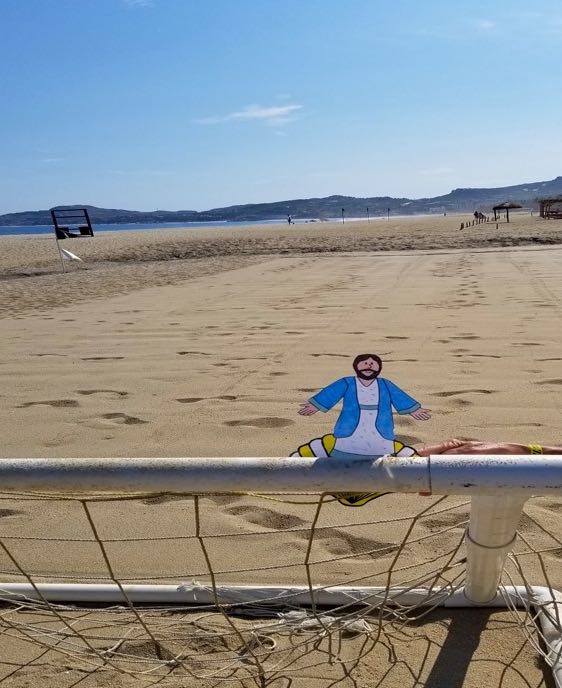 Playing goalie in a game of beach soccer