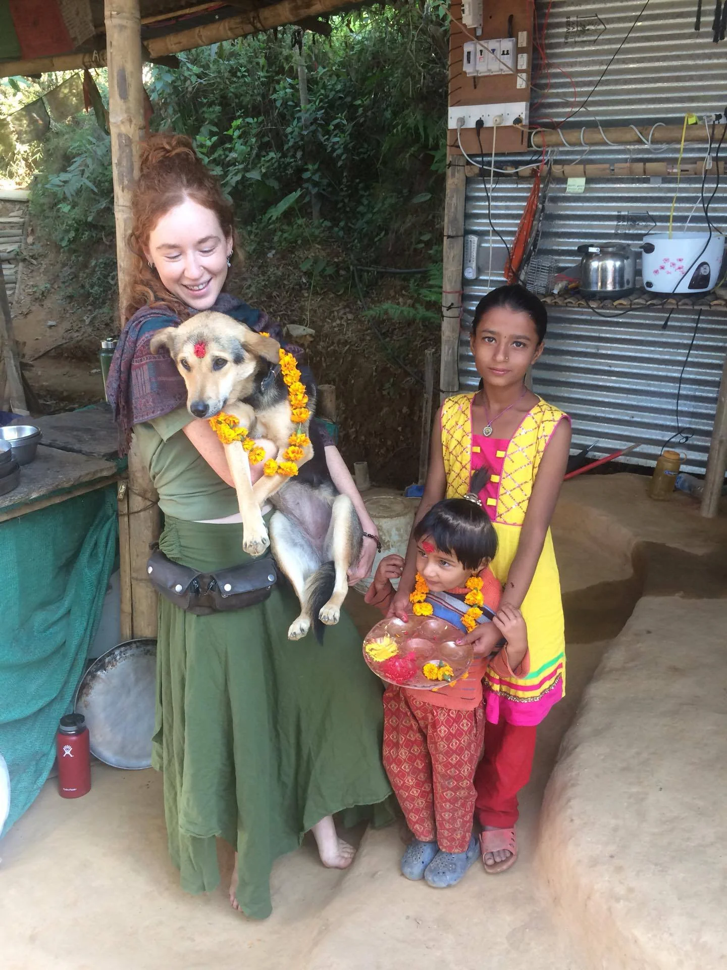 The second day of Tihar, Kukur Tihar, honors the dog. Our camp dog, Kavita, looks quite festive with her tika and garland!