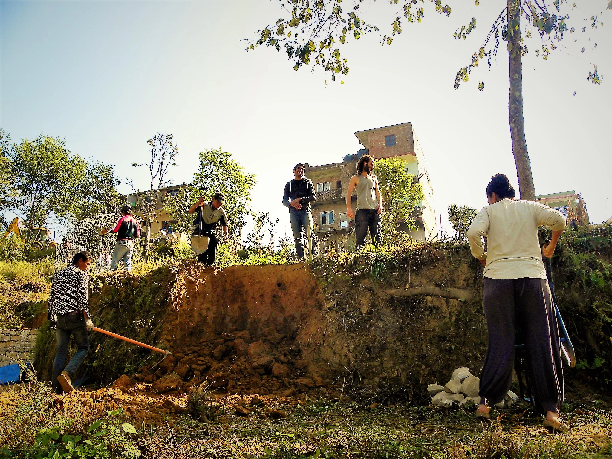 BEFORE - Setting the stage to build gabions for the retaining wall.