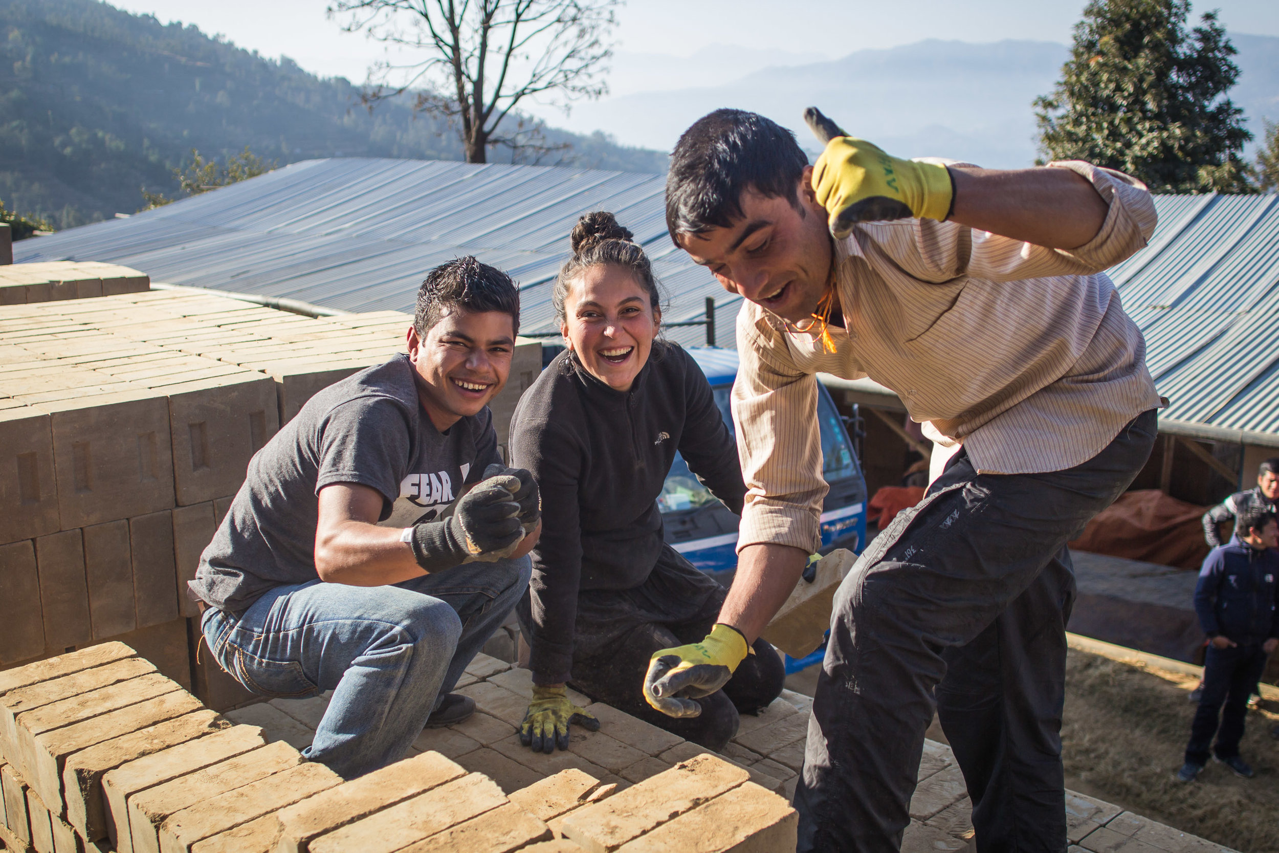 Our volunteer and Nepali team working together.jpg