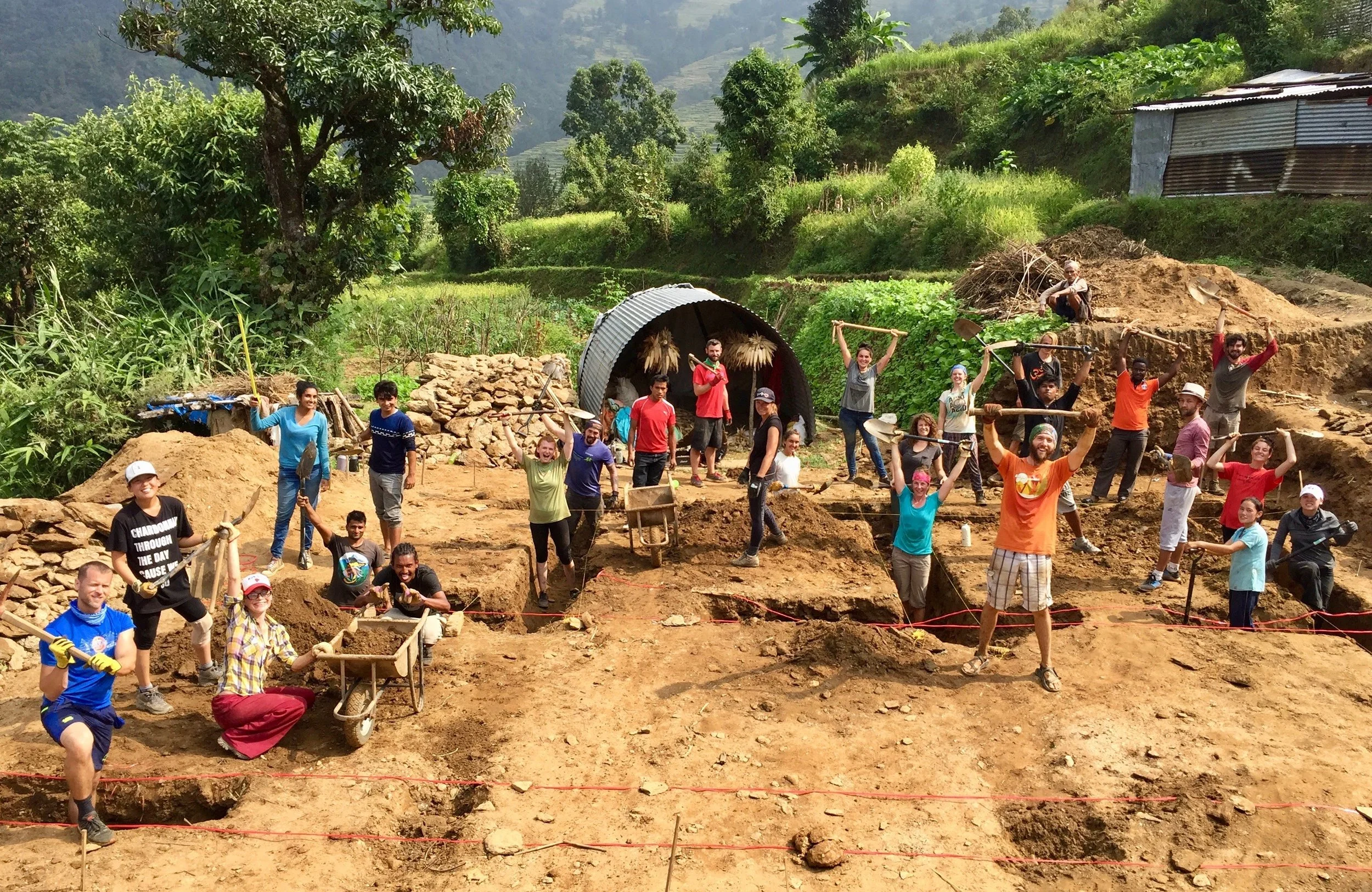 Our amazing “groundbreaking” team of volunteers and Nepali staff working hard to dig the foundation of our newest project, the Bimire Earthbag House.