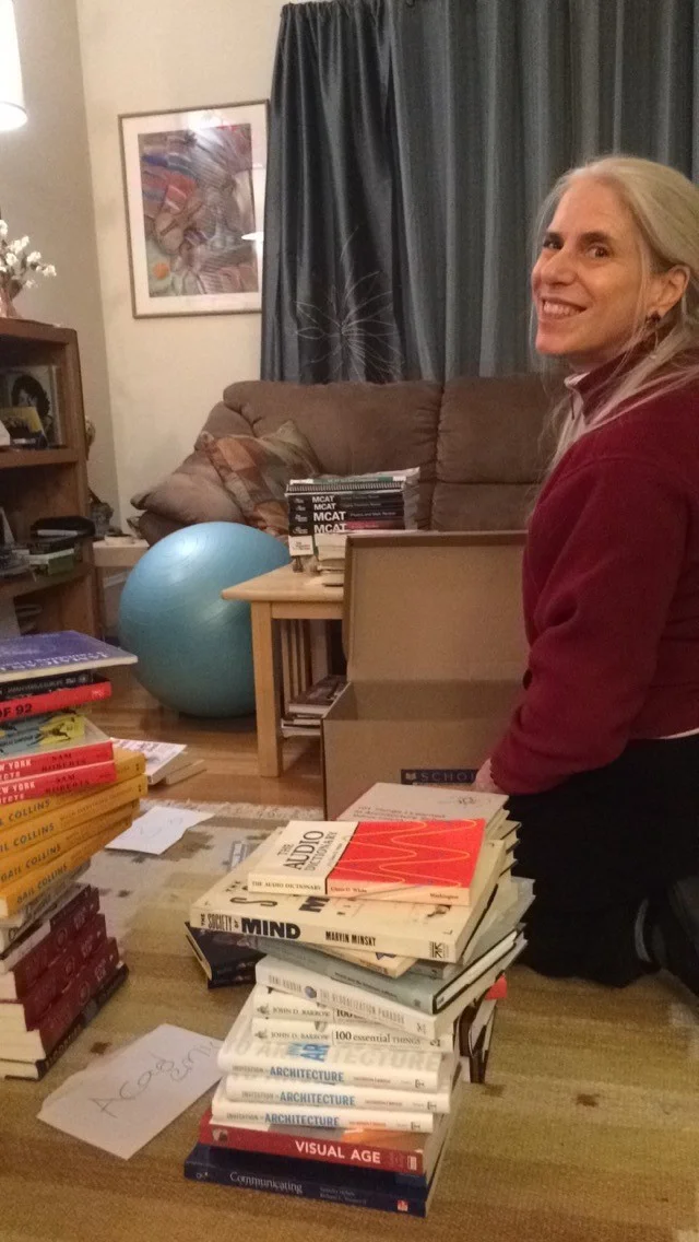 My Momma, helping to sort and organize books!