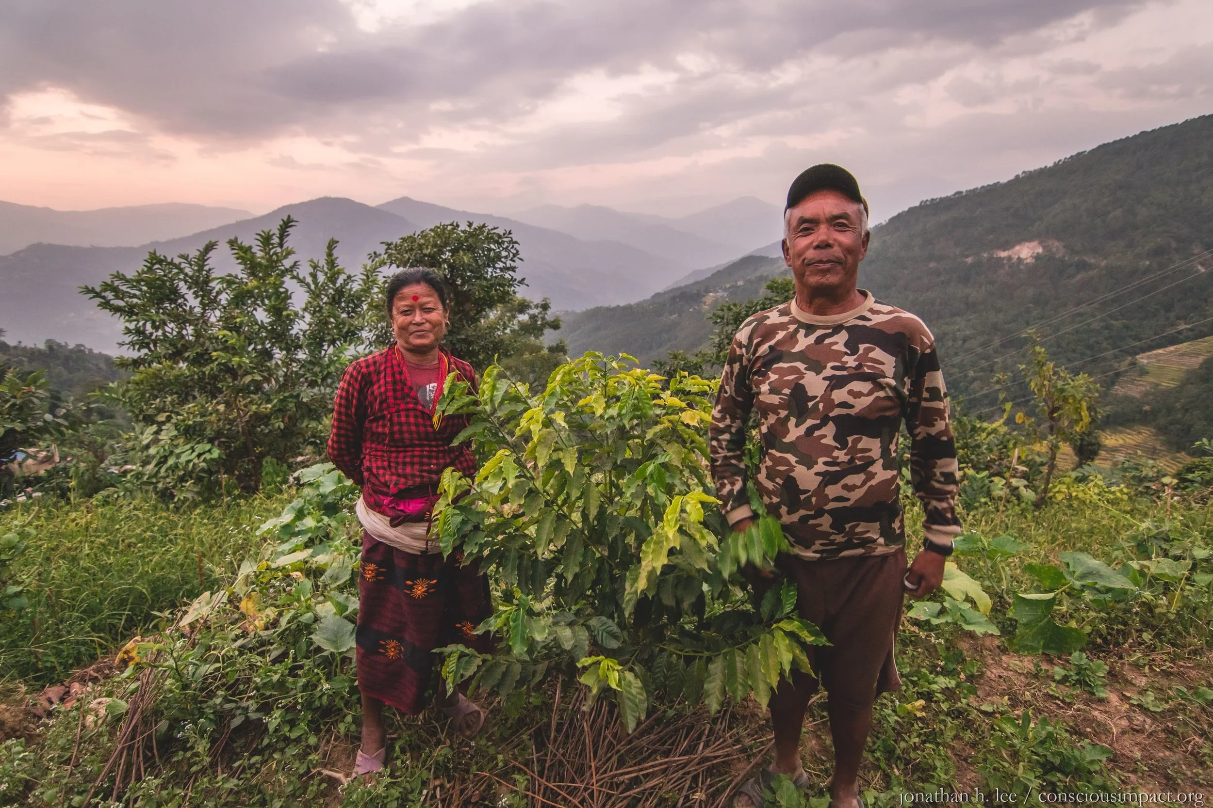 Amar and Sanu Kanchi Ranamagar stand proudly with one of their many coffee trees. Amar serves on the Takure Basic Organic Coffee Cooperative board and enthusiastically supports all of our agriculture initiatives in the area. Photo by Jonathan H. Lee