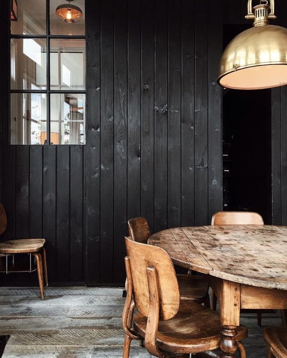 Image via Now and Then Blog - black stained wood panels.