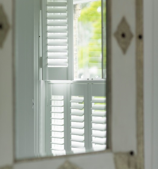 An alternative to curtains are shutters like these by Luxaflex.