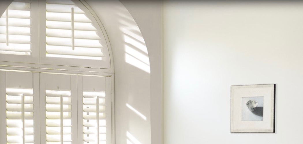 A lovely alternative to curtains are shutters by Luxaflex.