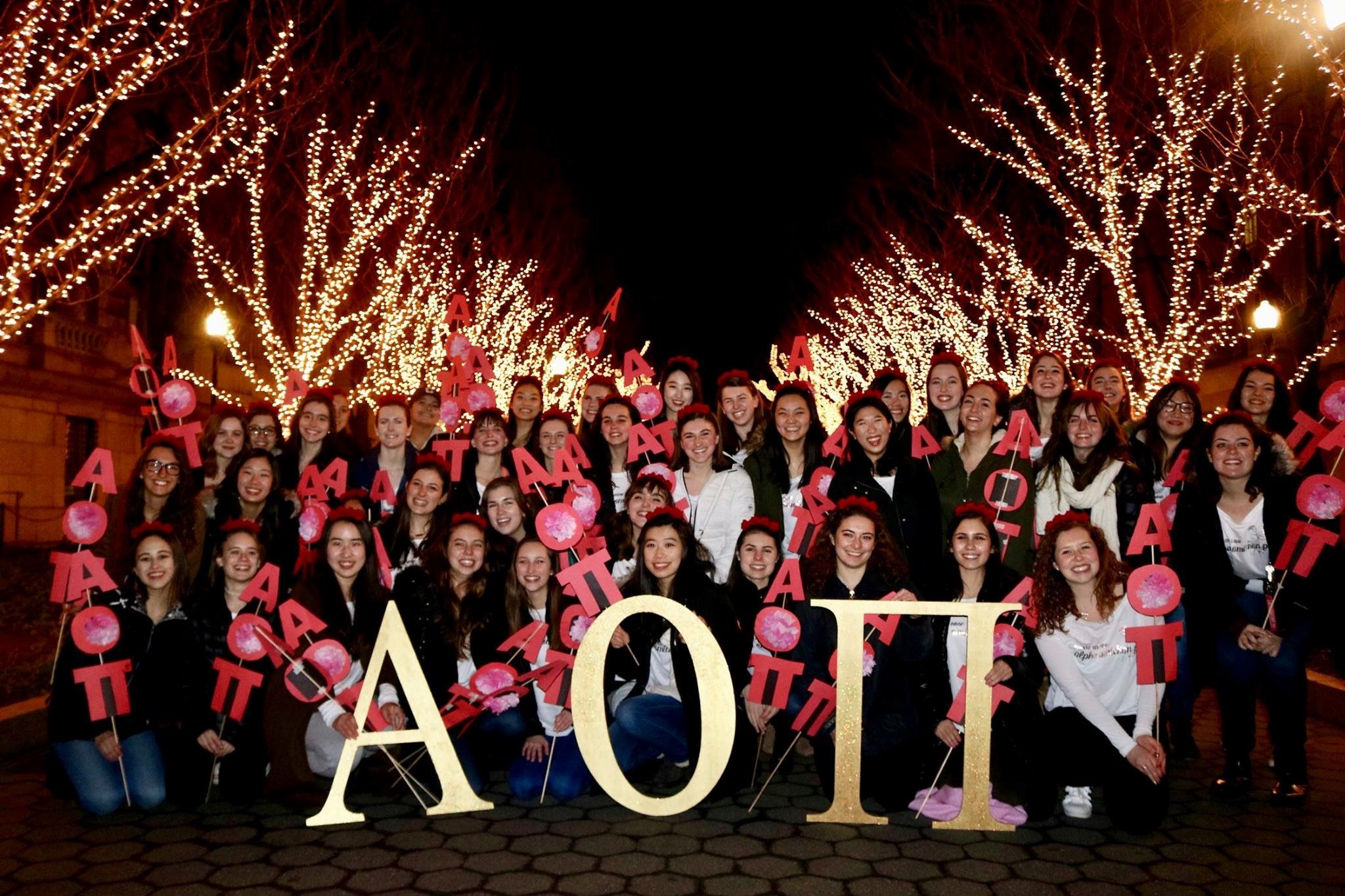All the new members on Bid Day 2017! Spot me under the second tree from the left.