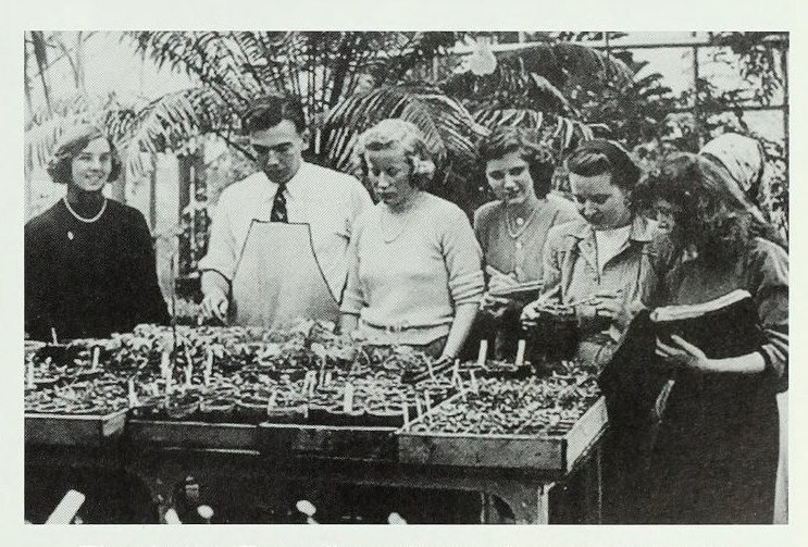 Barnard students and professor analyze plants, circa 1940-1950