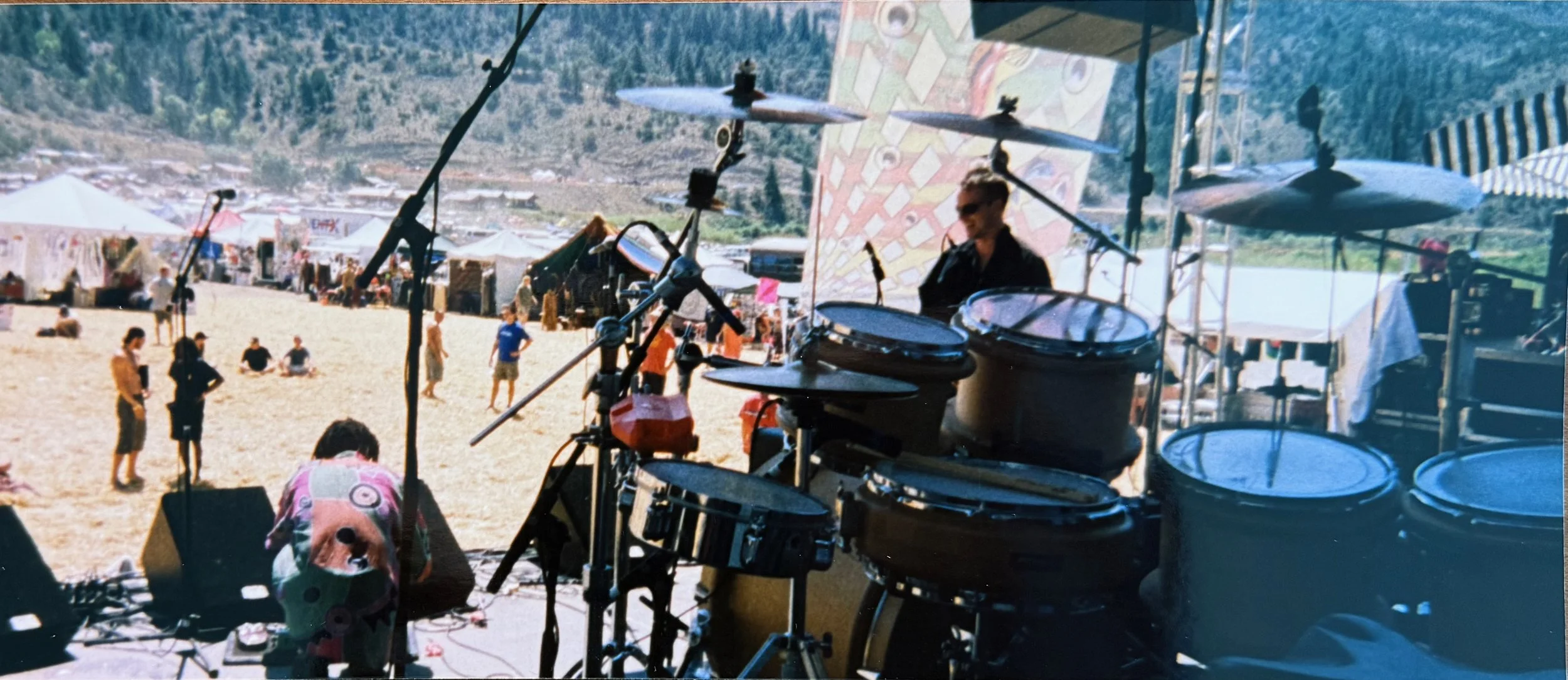 Luke's drumset with Djate and James onstage in Colorado 2002.jpeg
