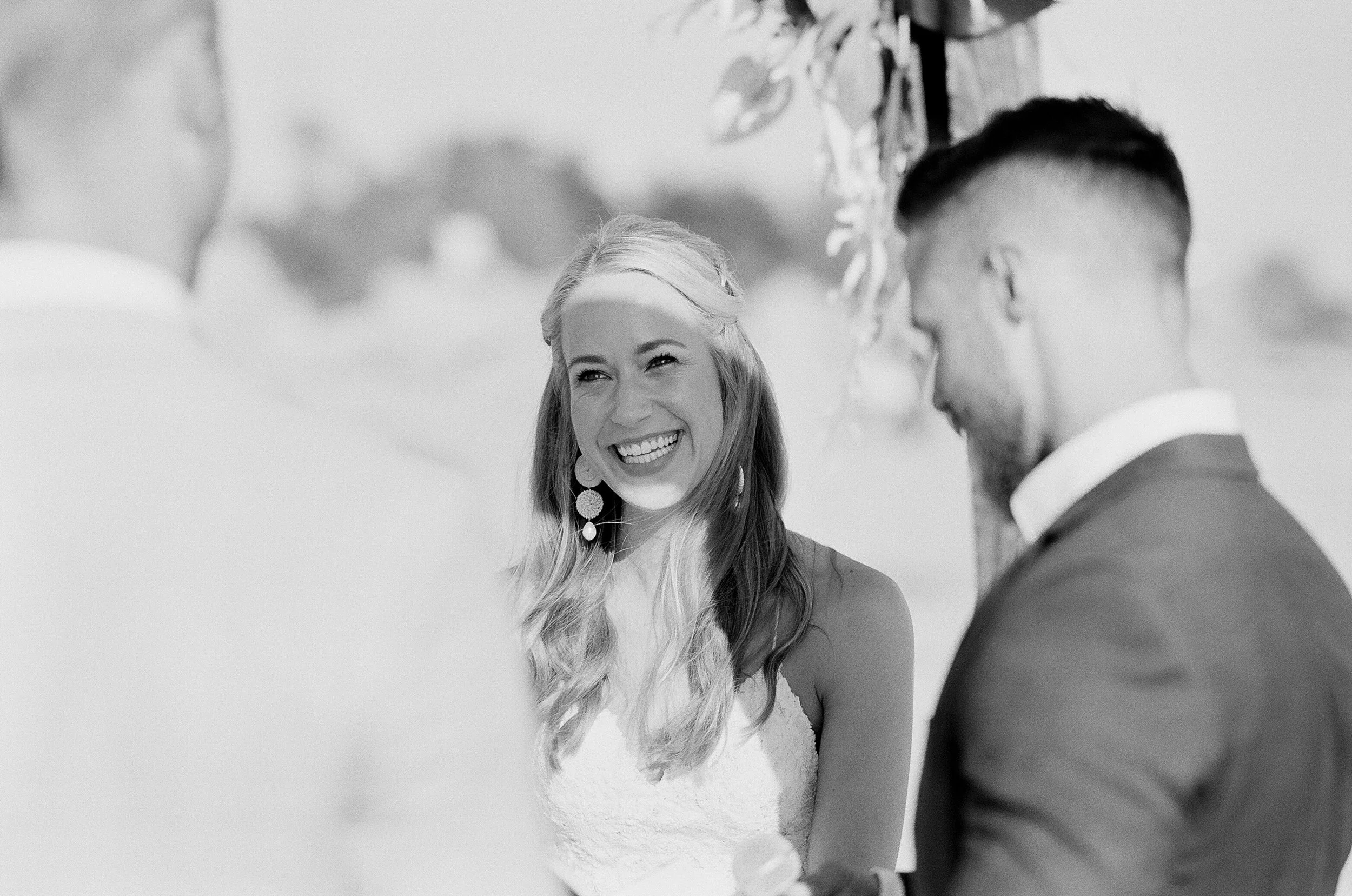 Black and white film bride at ceremony