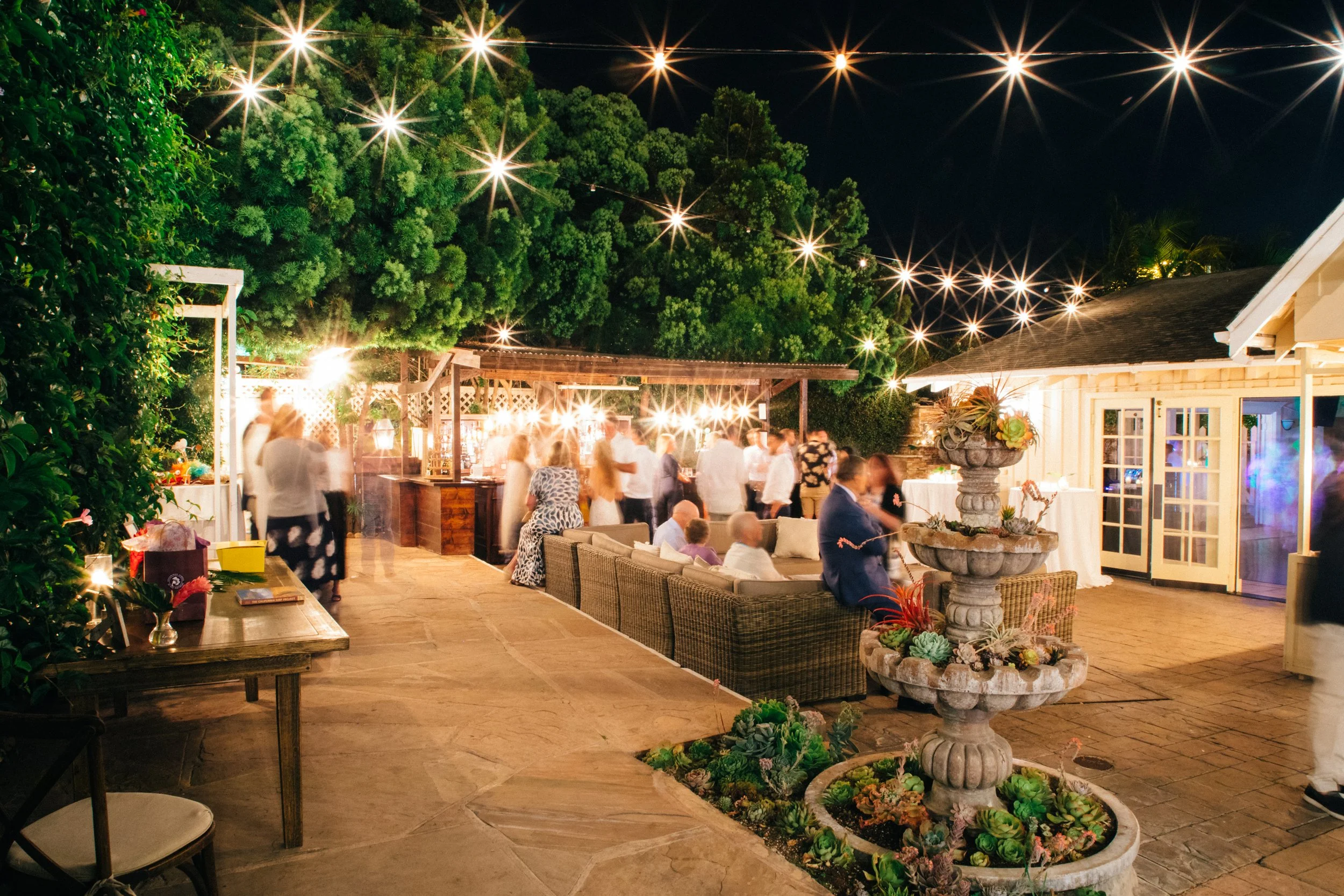 Nighttime wedding reception with twinkle lights