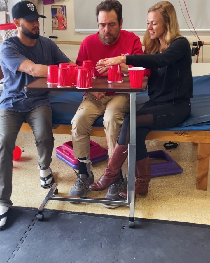 Ryan continues to work hard and try his best. Whitney is an OT who&rsquo;s really focusing on getting Ryan to use his left arm and hand and increase his range of motion. Here she has him grabbing cups and stacking them but adding rotation inward and 