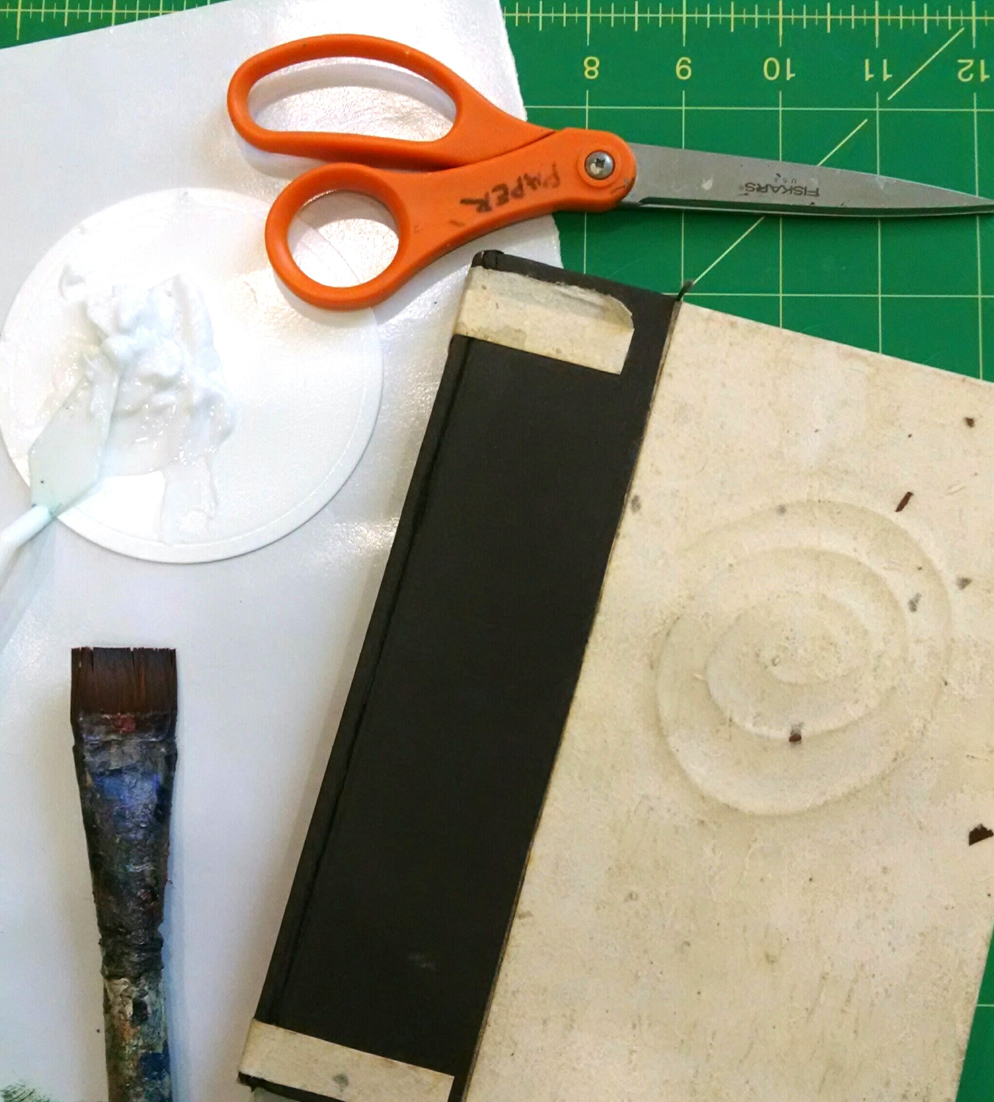 Materials needed: Golden Soft Gel Matte, old paint brush, a journal, scissors, variety of collage papers snd fabrics. I like to use Matte Gel because it keeps the character of the paper and fabric and it's not sticky like the Gloss version.