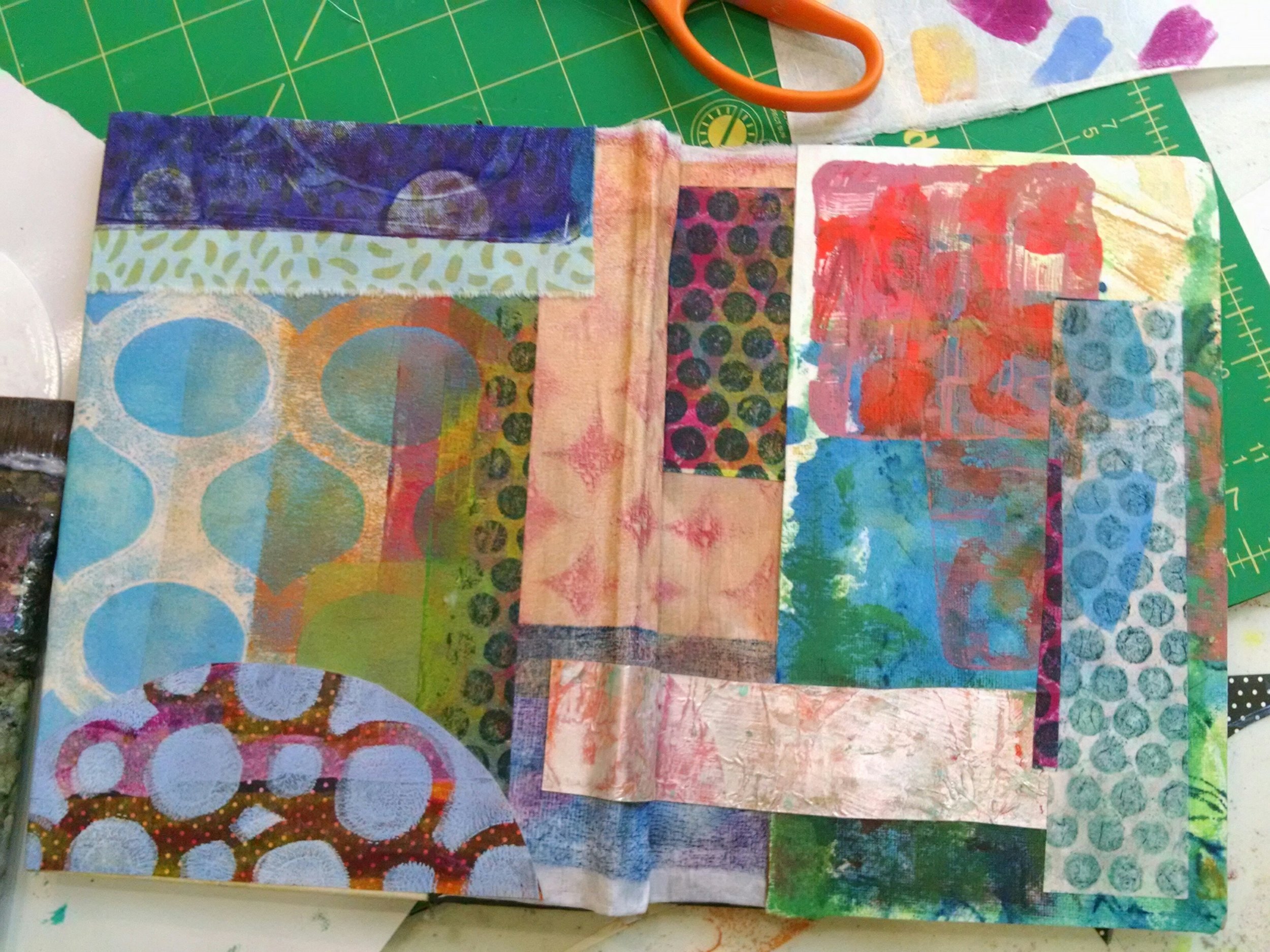 ©Christine Sauer, collaged front and back journal cover using monoprinted paper and fabric.