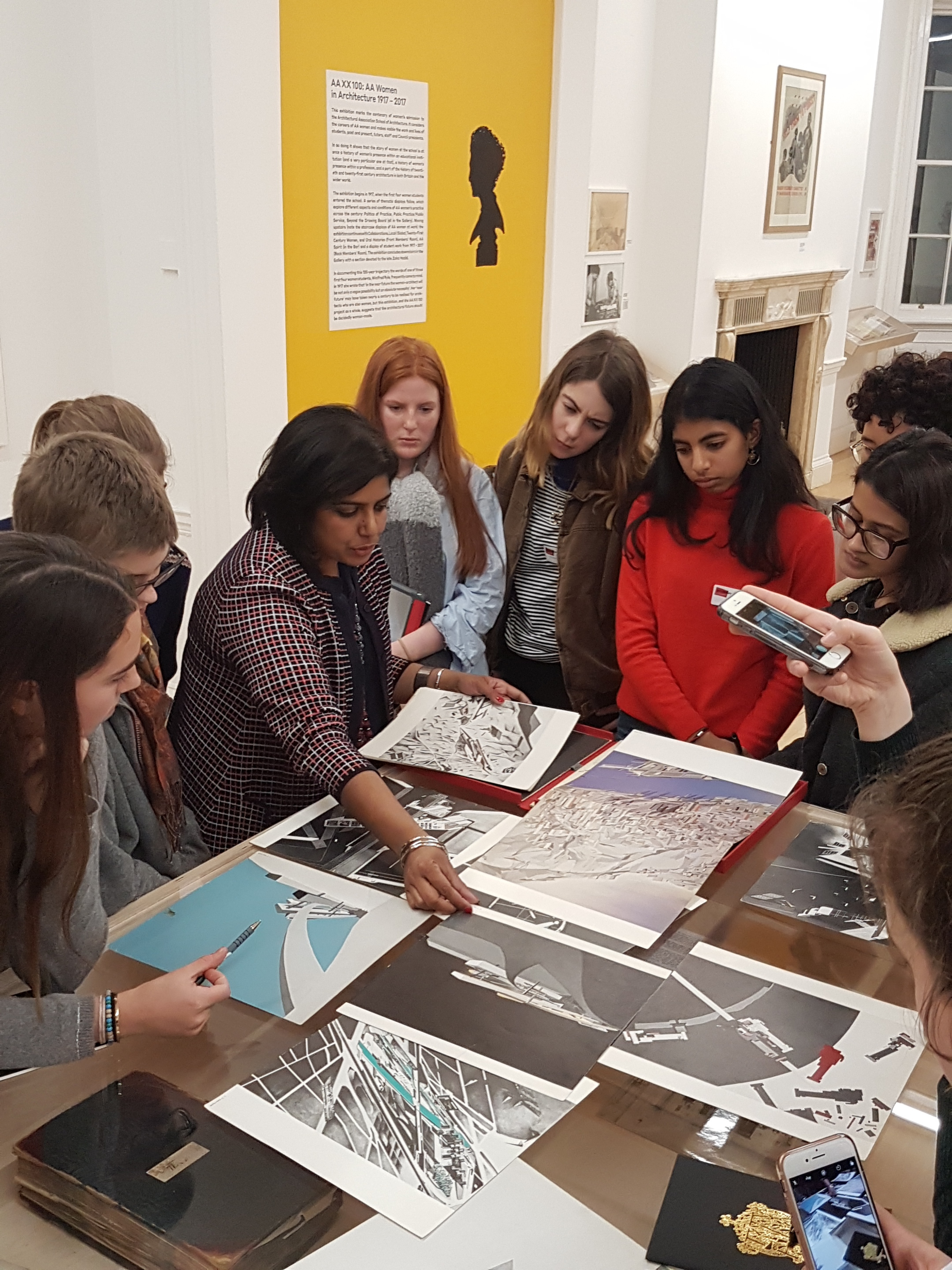 Manijeh Verghese, Head of Lectures & Public Programme Curator at the AA, giving a tour of AA XX 100 exhibition