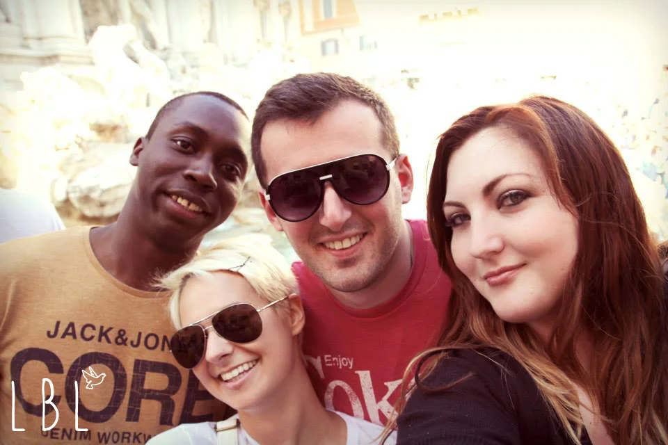 The 4 of us at the Trevi fountain in Rome 