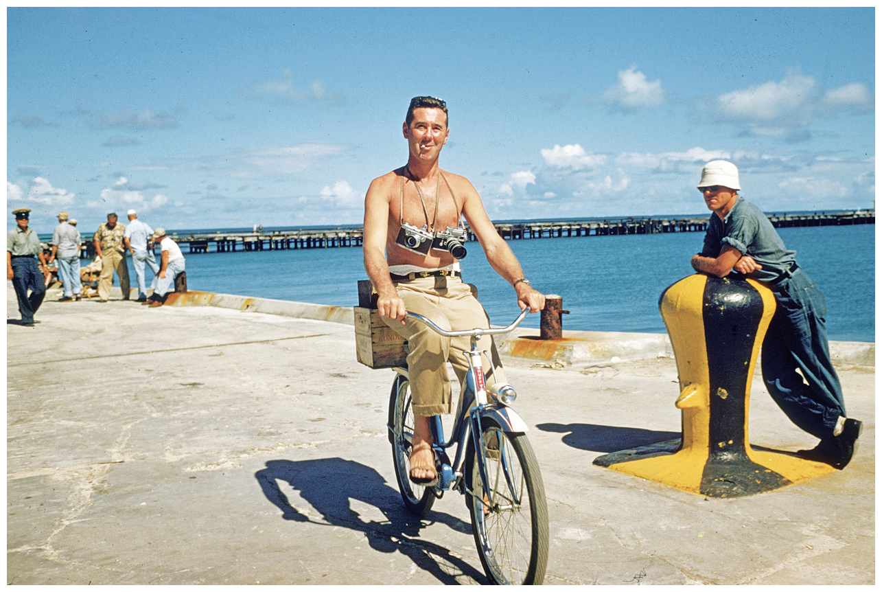 Slim Aarons,&nbsp;Self Portrait Riding Bike in Hawaii,&nbsp;1955 