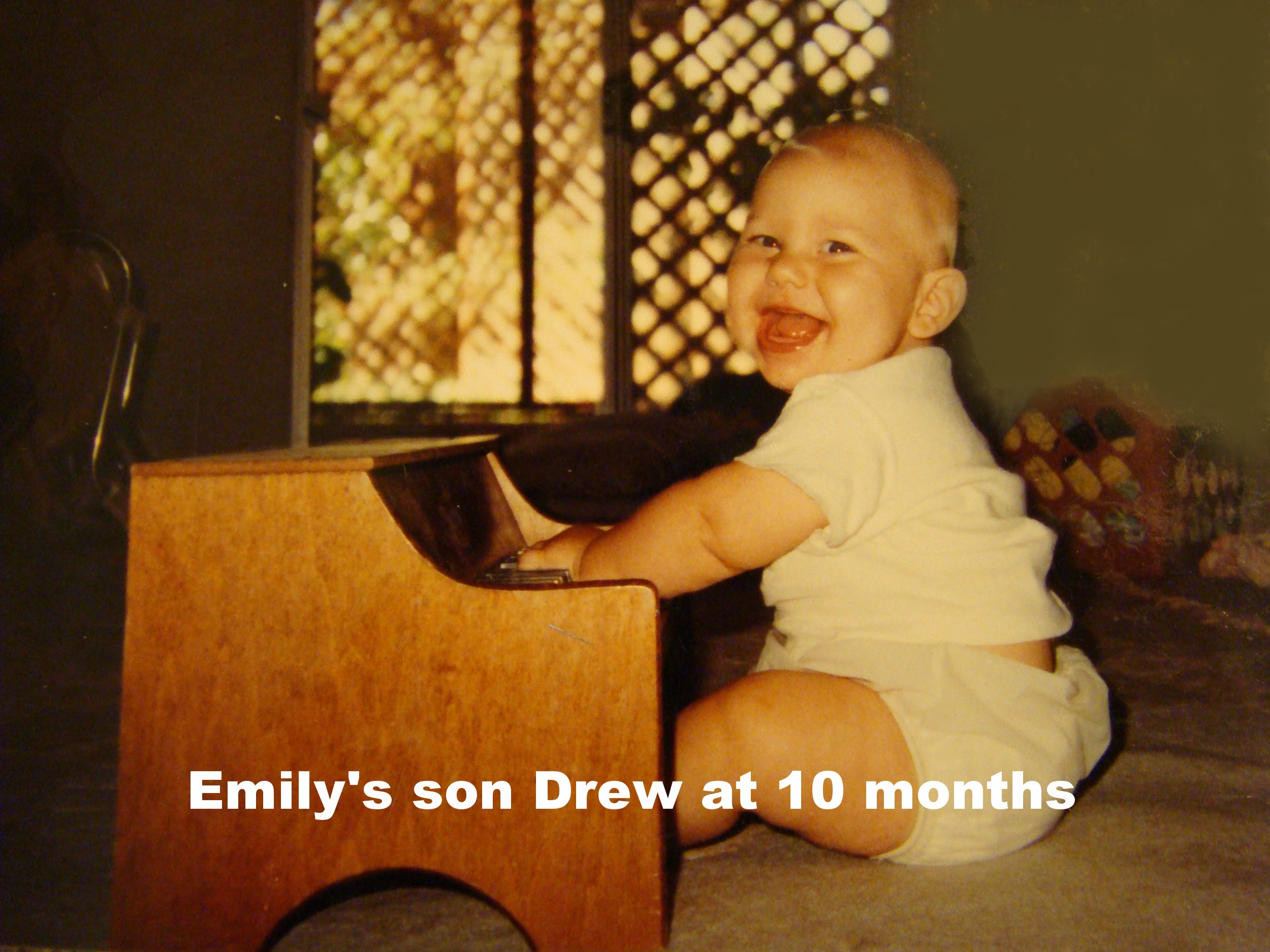 Drew-Culver-at-6-months at the piano.jpg