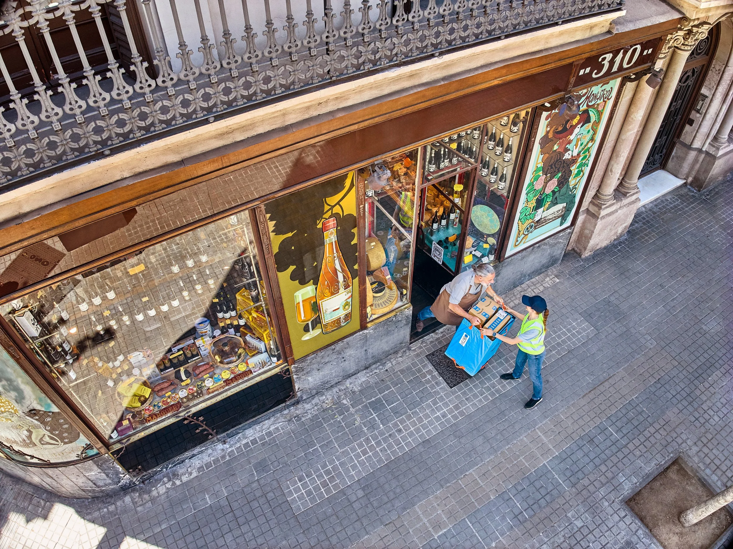 HD_2025_ES_032-ES-Hub-Artisinal_Grocery-At_Door_Tote-DA-Drone-05990_R2_Final 1.jpg