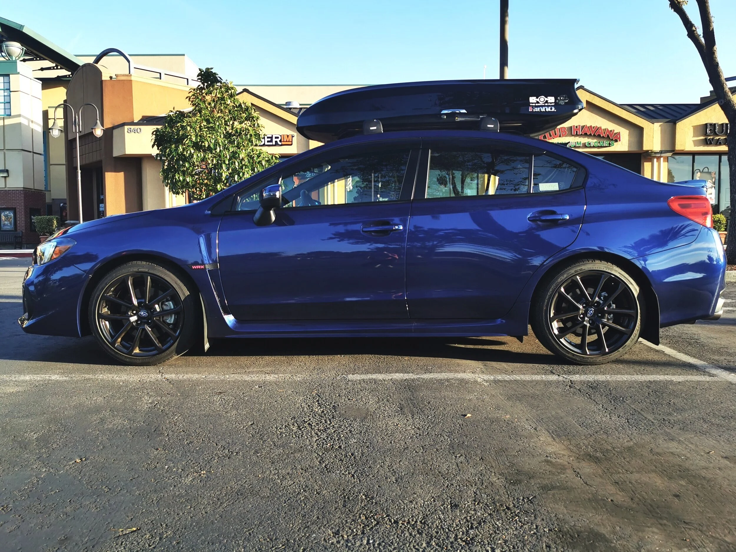 Sitting on Bilstein and Swift Spec-R with 1/2” spacers in the rear, 3/8” spacer in the front
