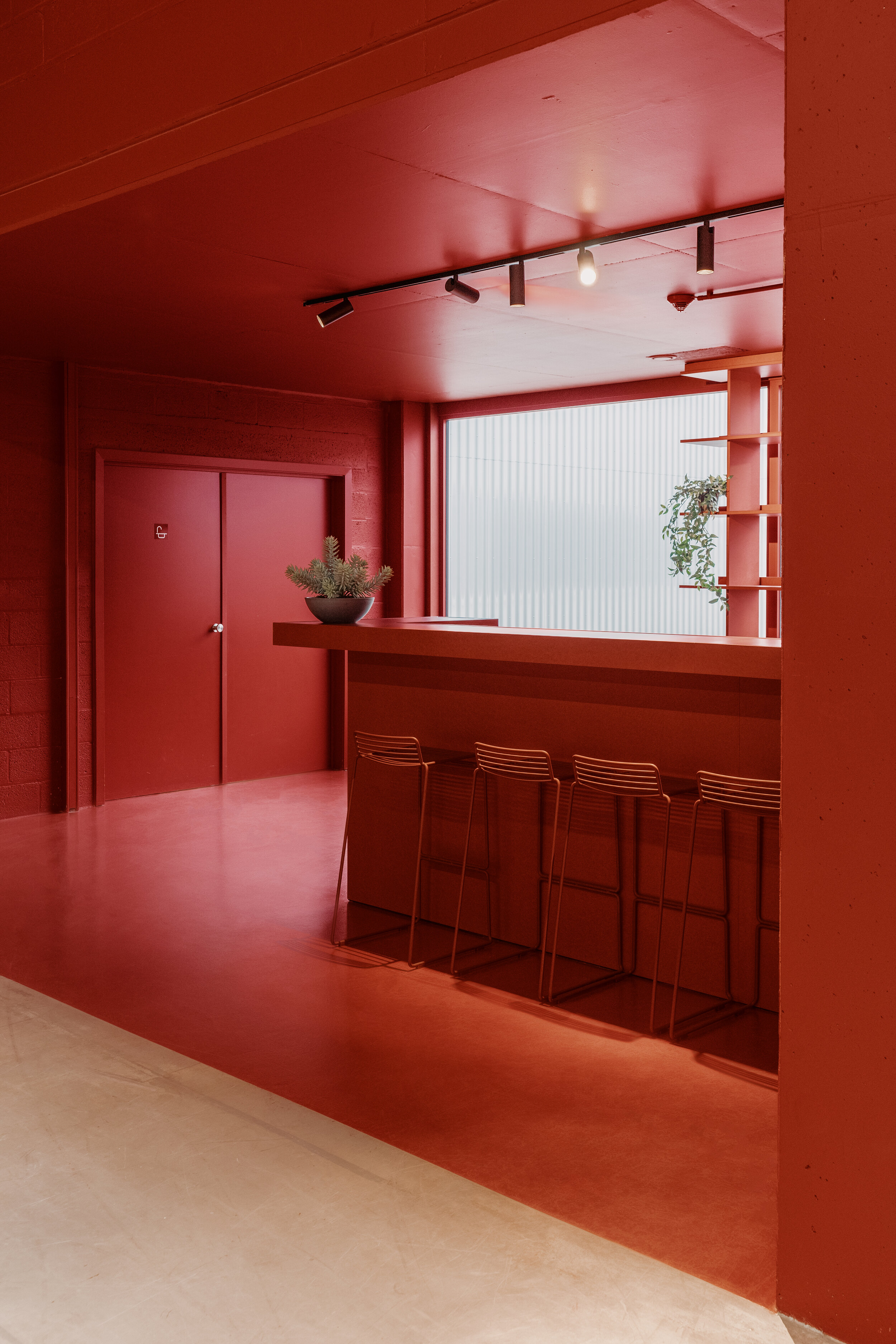  Additionally, vibrant red alterations complete the barely-touched but instantly recognisable event hall. 
