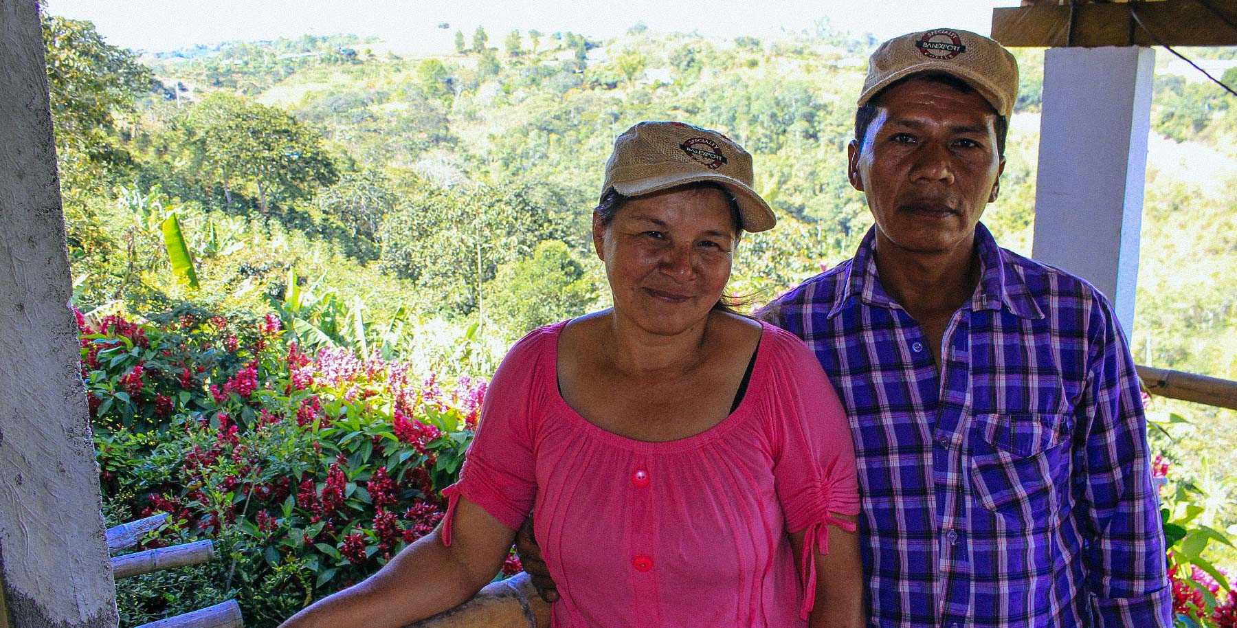 Martha Luz Peña and Luis Alberto Chate overlooking their farm