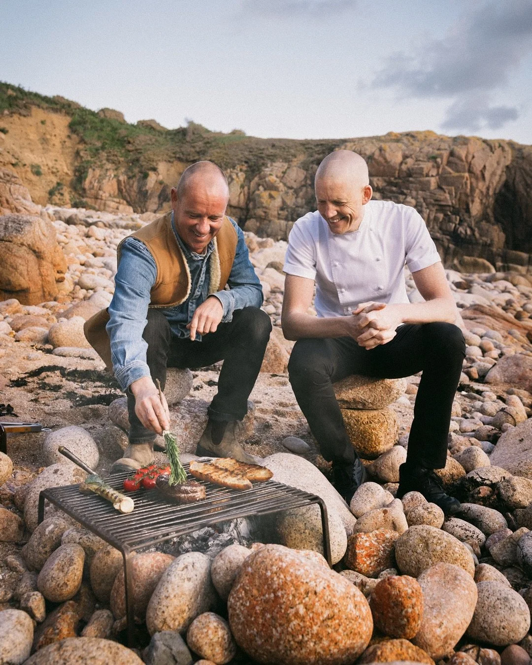 Two chefs. One fire. St Ouen&rsquo;s Bay.

Something is coming this summer with @willholland79 and @atlanticjersey .

Tickets in bio for lunch. 

📸 @nataliemayerweddings