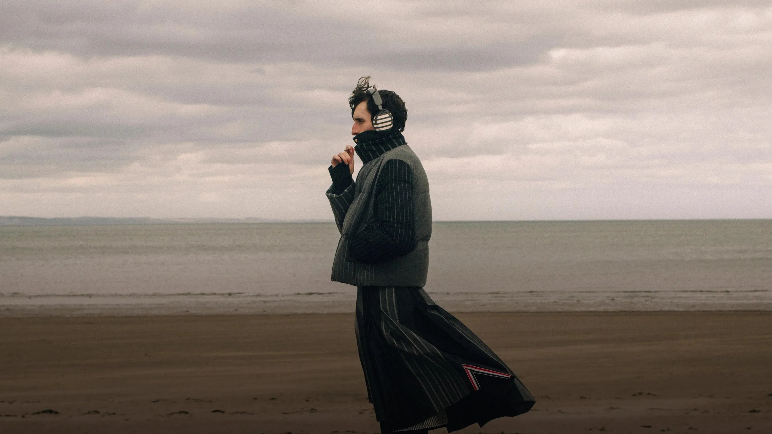 Bose x Thom Browne campaign banner — QuietComfort Ultra Headphones hero