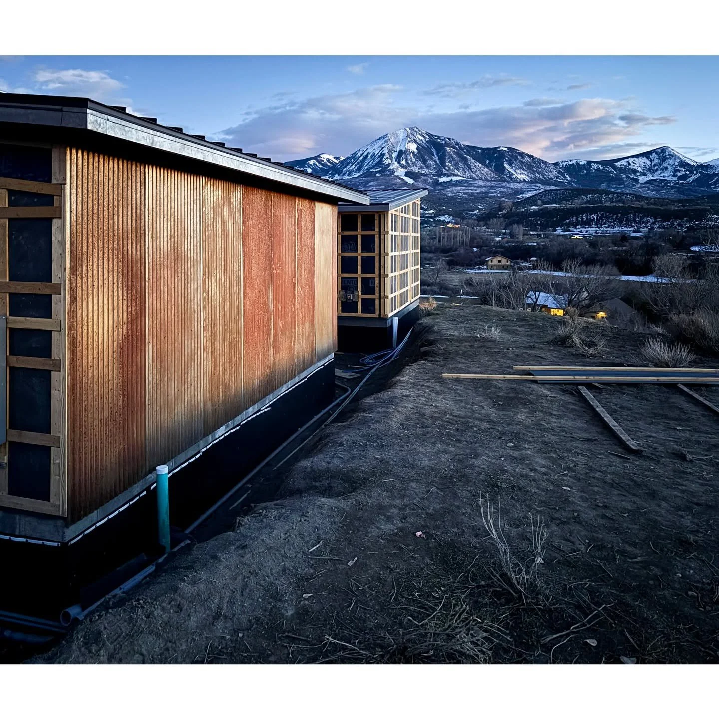 Our Pattern House is finally getting its winter coat! We love how the rusted siding compliments the landscape around it so well while being fire resilient and low maintenance. Keep following along as Paonia gets it's first @passivehouseinstituteus Pa