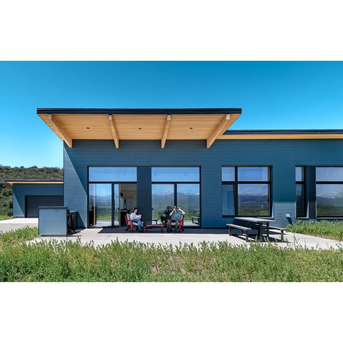 Our Elk River House is ready for summer! This super-insulated prefab home is located just outside of Steamboat Springs, with incredible views to the ski area and Park Range across the verdant Elk River Valley. Situated low to the landscape with gener