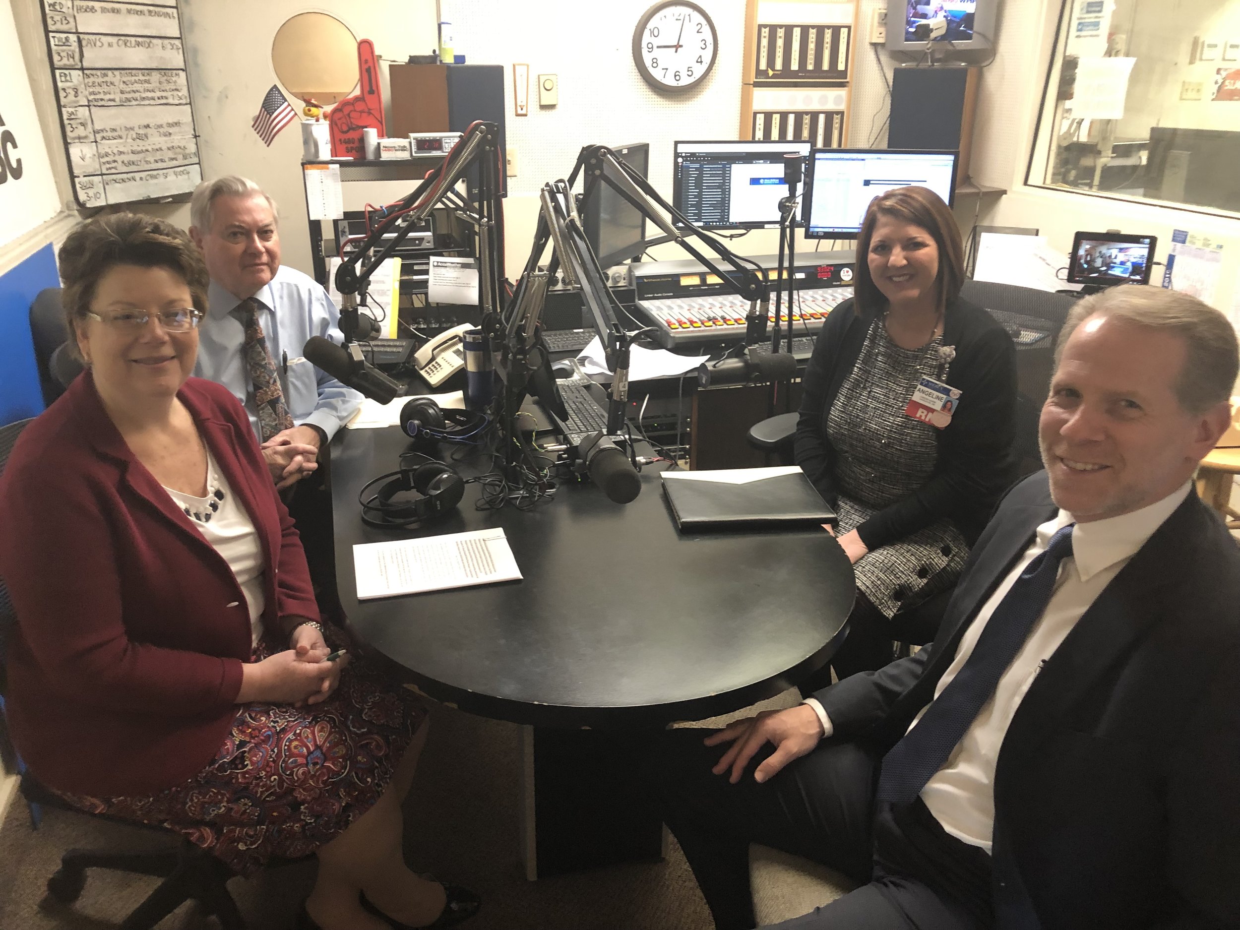 L-R: Medicine Center Pharmacy’s Nancy Wharmby, executive vice president and Paul White, R. Ph., discuss colon cancer awareness and treatment with Mercy Medical Center’s Angelina Barbato, cancer nurse navigator and Dr. Russell Ramey.