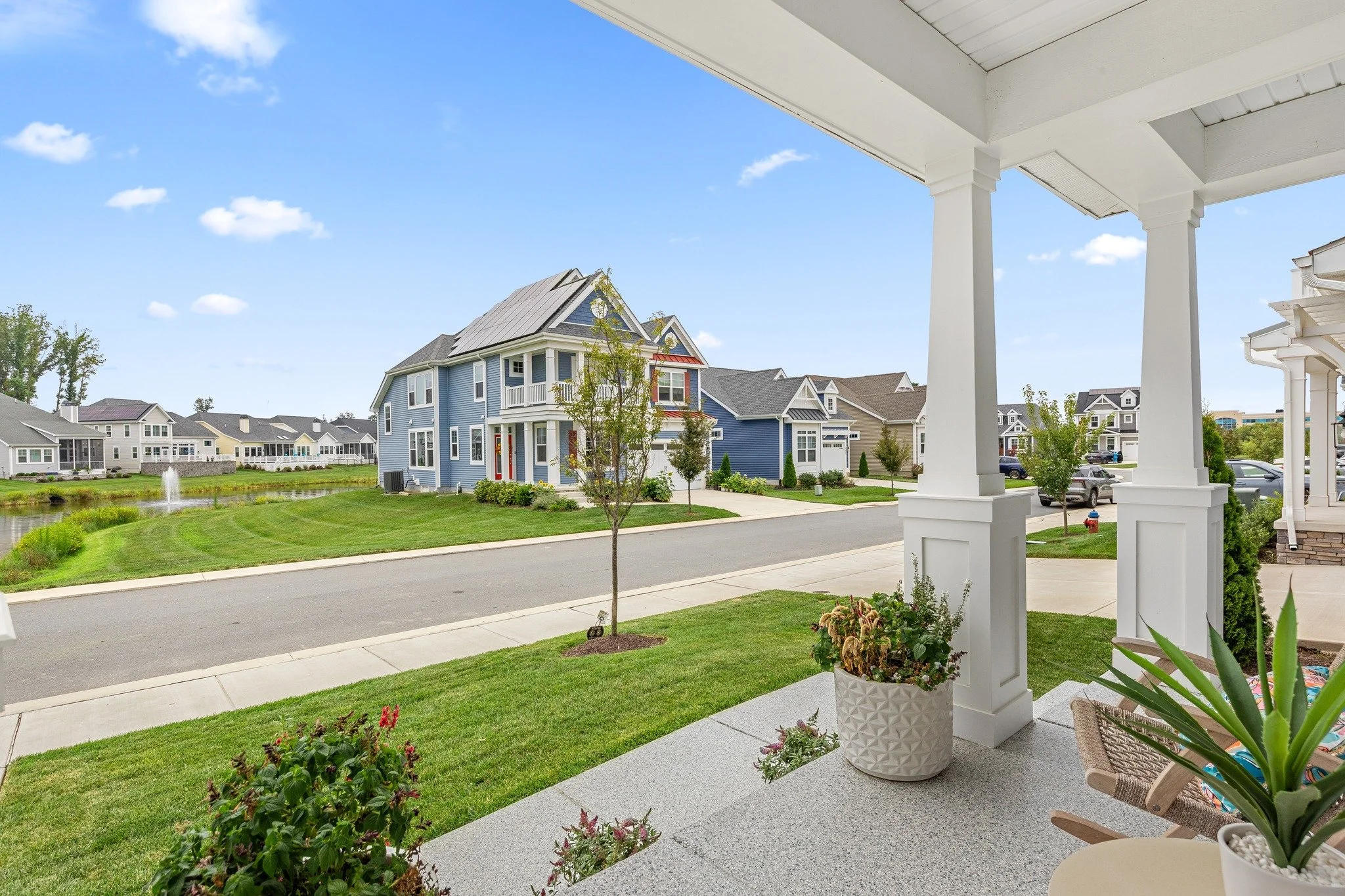 If front porches could talk, this one would tell stories of lemonade summers, slow sunsets, and neighborhood hellos.
Straight out of a small-town movie—and waiting for its next chapter. 
 #views #RealEstatePhotography #LuxuryListing #CoastalLiv