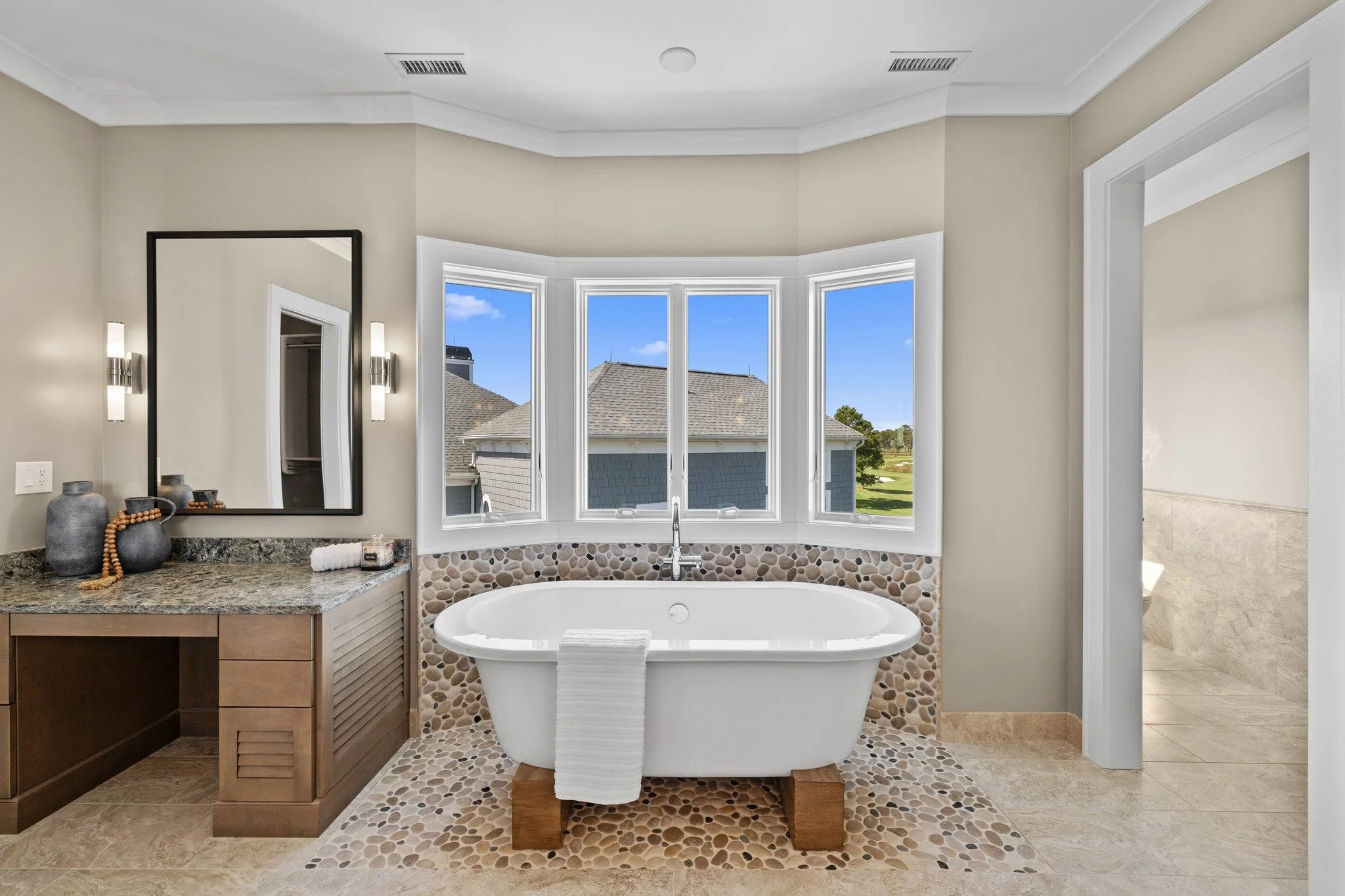 Soak in the stillness.
With views like this and a tub that begs you to stay a little longer, even the busiest days have a soft landing🛁
 #LuxuryListing #Trusted #RealEstatePhotography #views #interiorsdesign #interiors