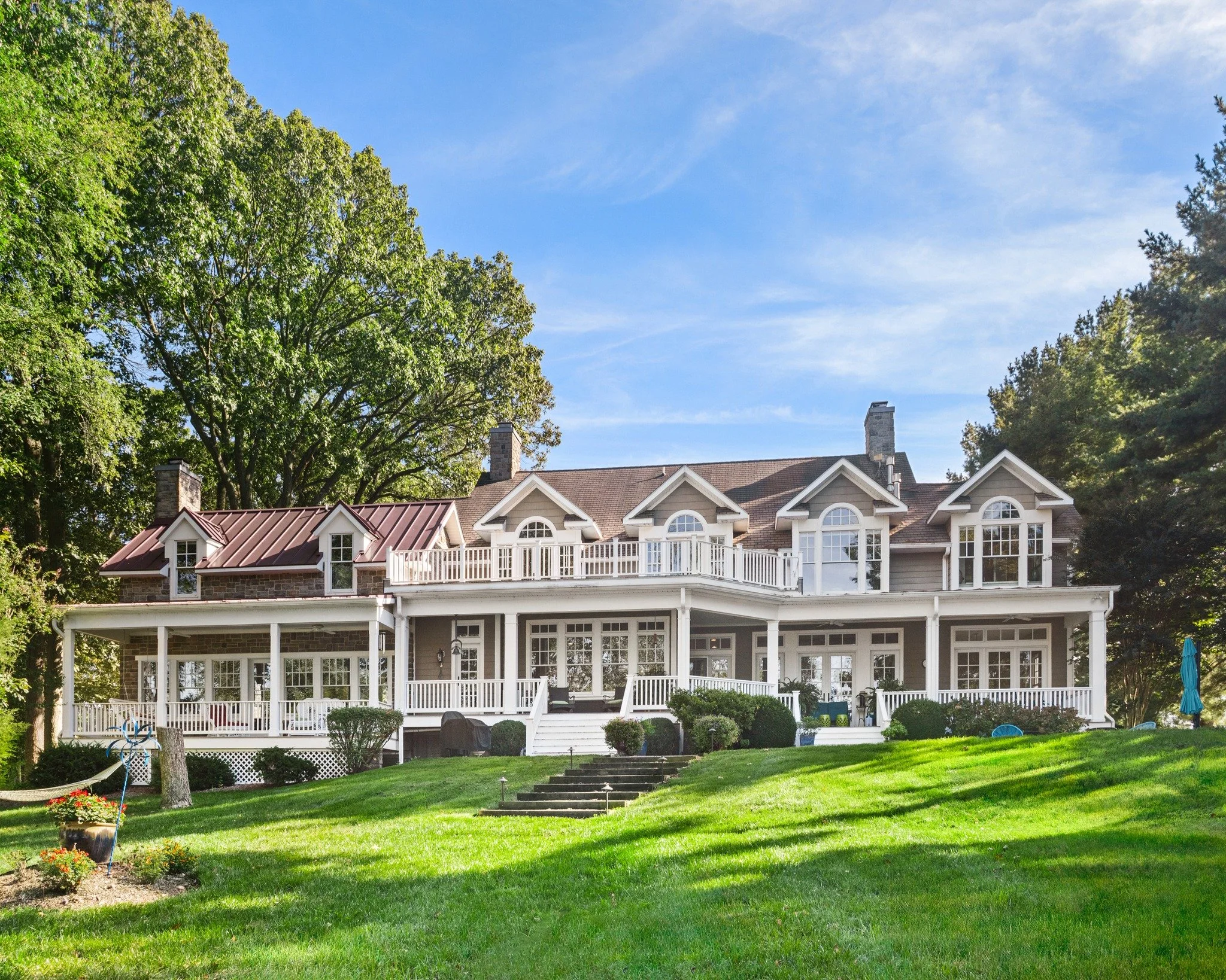 Tucked among the trees, this estate feels both grand and grounded &mdash; a place where elegance and stillness coexist in perfect rhythm🏡 #RealEstatePhotography #Trusted #AtlanticExposure #porchsitting #views