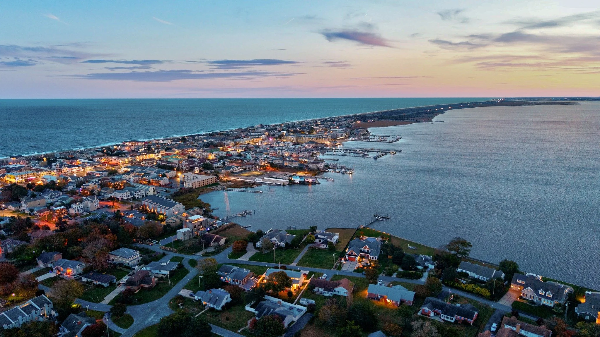 From above, you can see everything that makes our coastal towns unforgettable &mdash; the calm of the bay, the energy of the ocean, and the glow of twilight tying it all together.✨
 #AtlanticExposure #Trusted #RealEstatePhotography #DronePhotography 