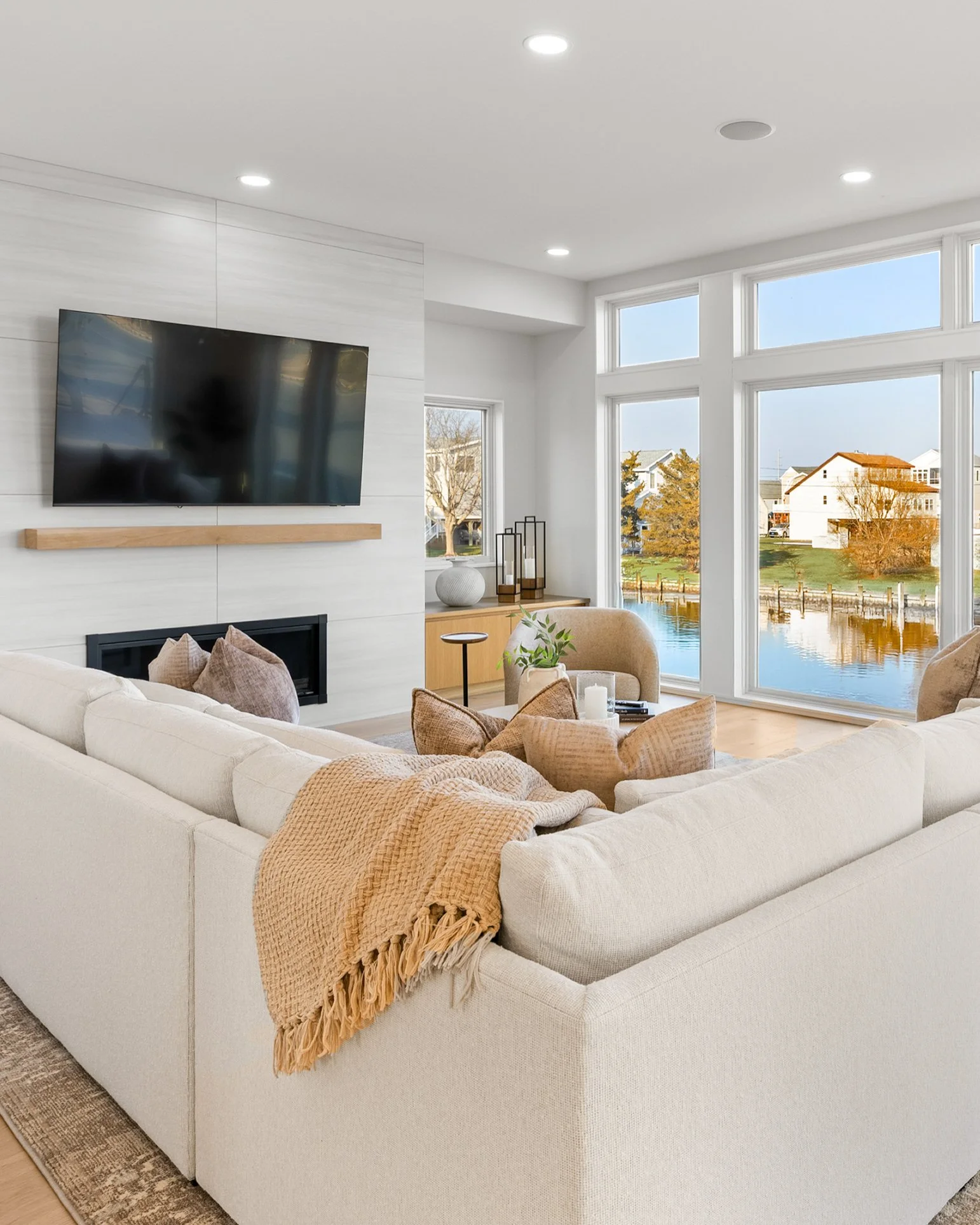 Refined doesn&rsquo;t have to try hard.
It just feels right the moment you walk in.
The living room carries that effortless elegance &mdash;
light moving softly across the floors,
intentional furniture placement that invites conversation,
and archite