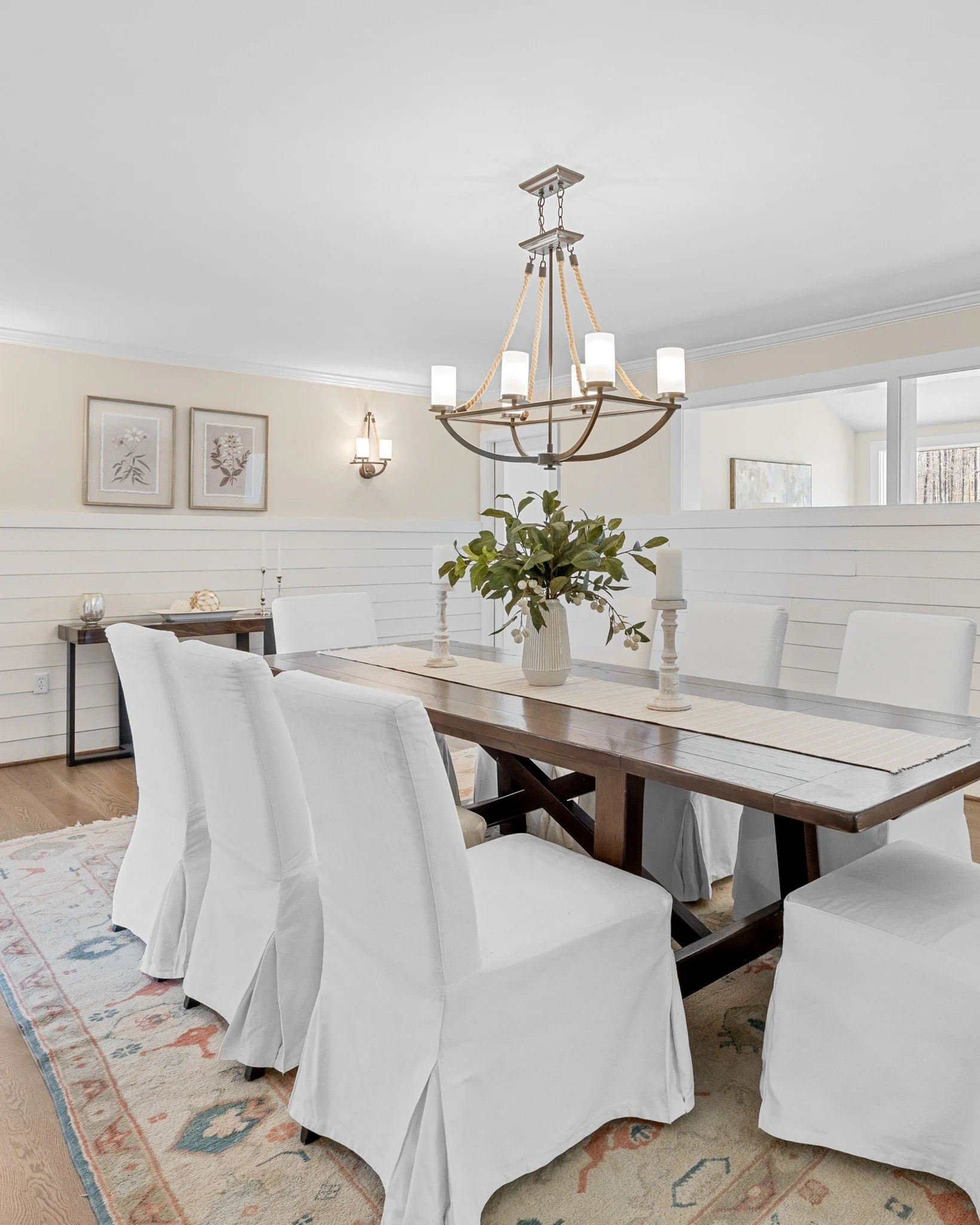Gather here. The long table invites conversation, the statement light adds a touch of drama, and every corner of this space feels open, effortless, and ready for life&rsquo;s everyday moments. From every perspective, it&rsquo;s a home that welcomes y