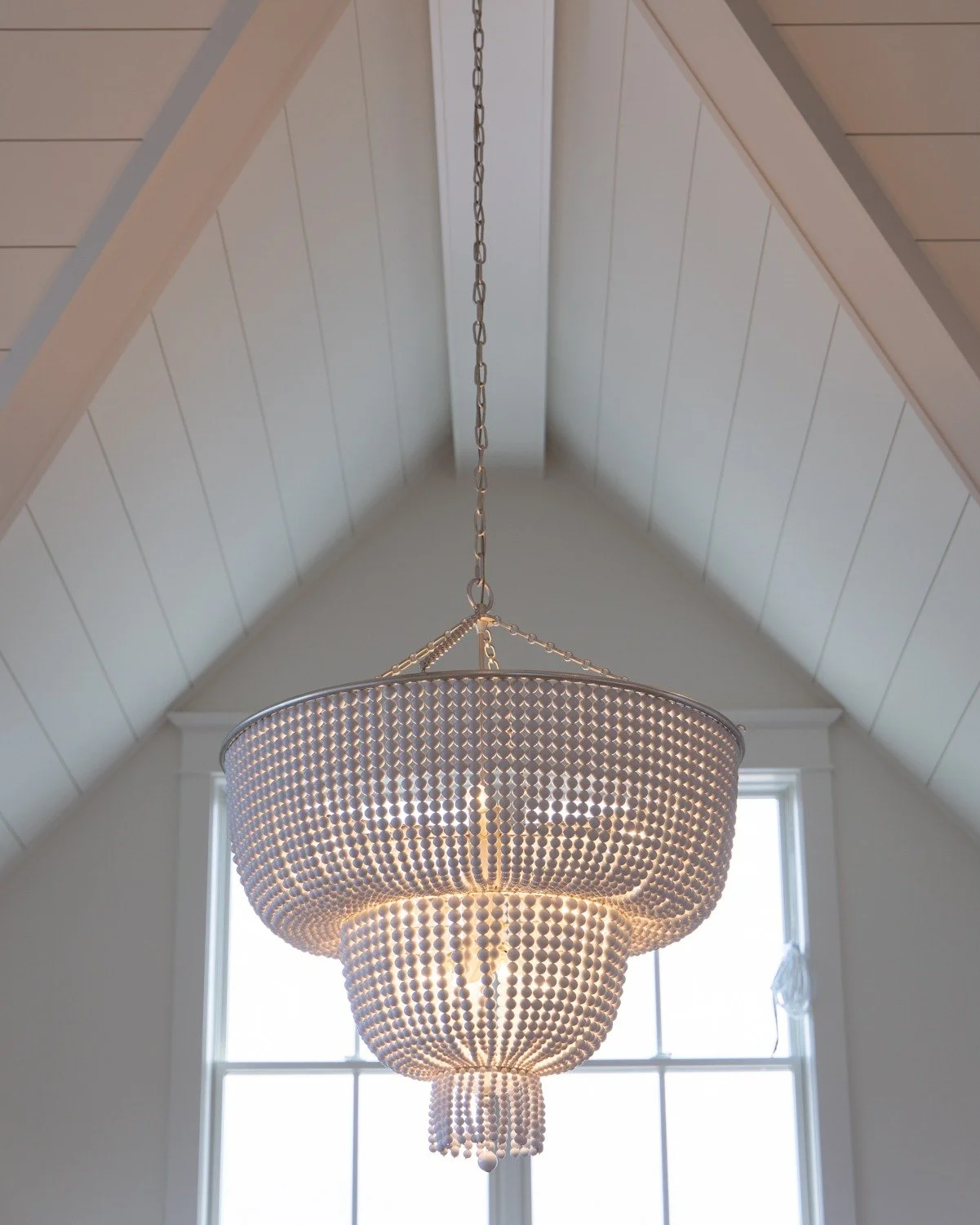 Bright, airy, and made for gathering. And honestly, who wouldn&rsquo;t love that chandelier? 😍