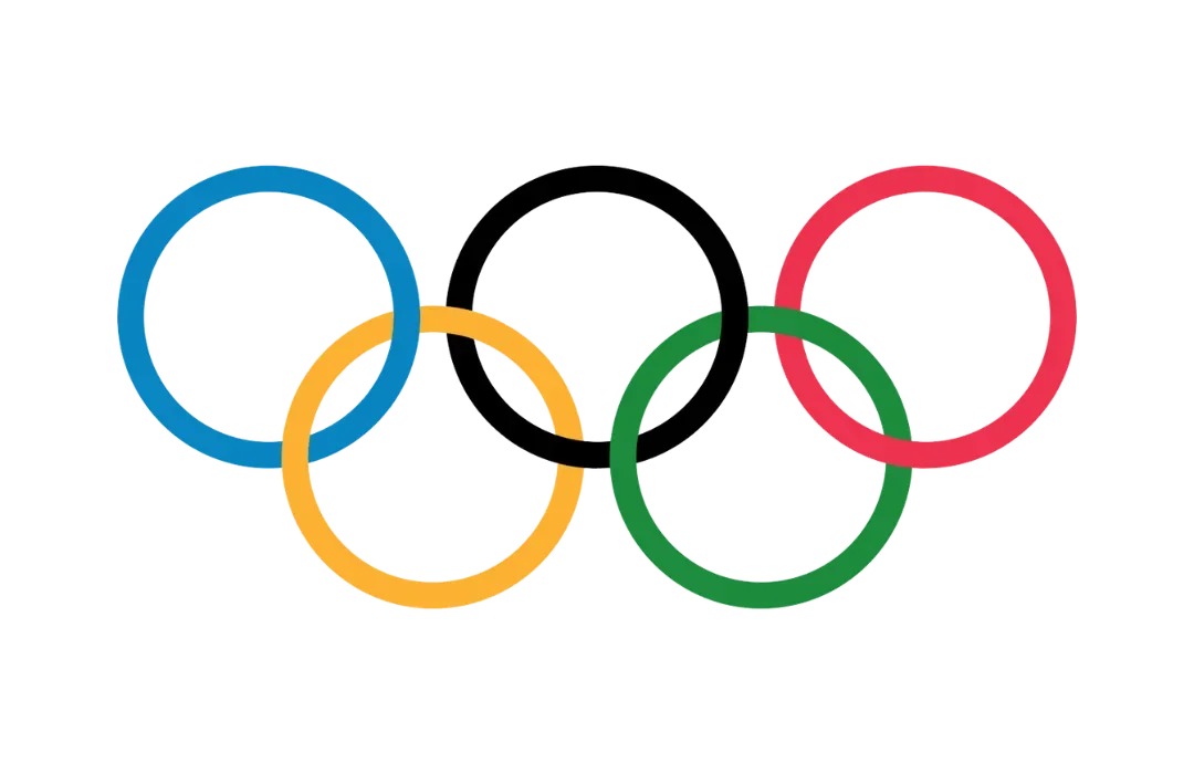 The Olympic rings in blue, yellow, black, green, and red colors stacked in a pattern with the blue, black, and red rings on top and the yellow and green rings on the bottom.