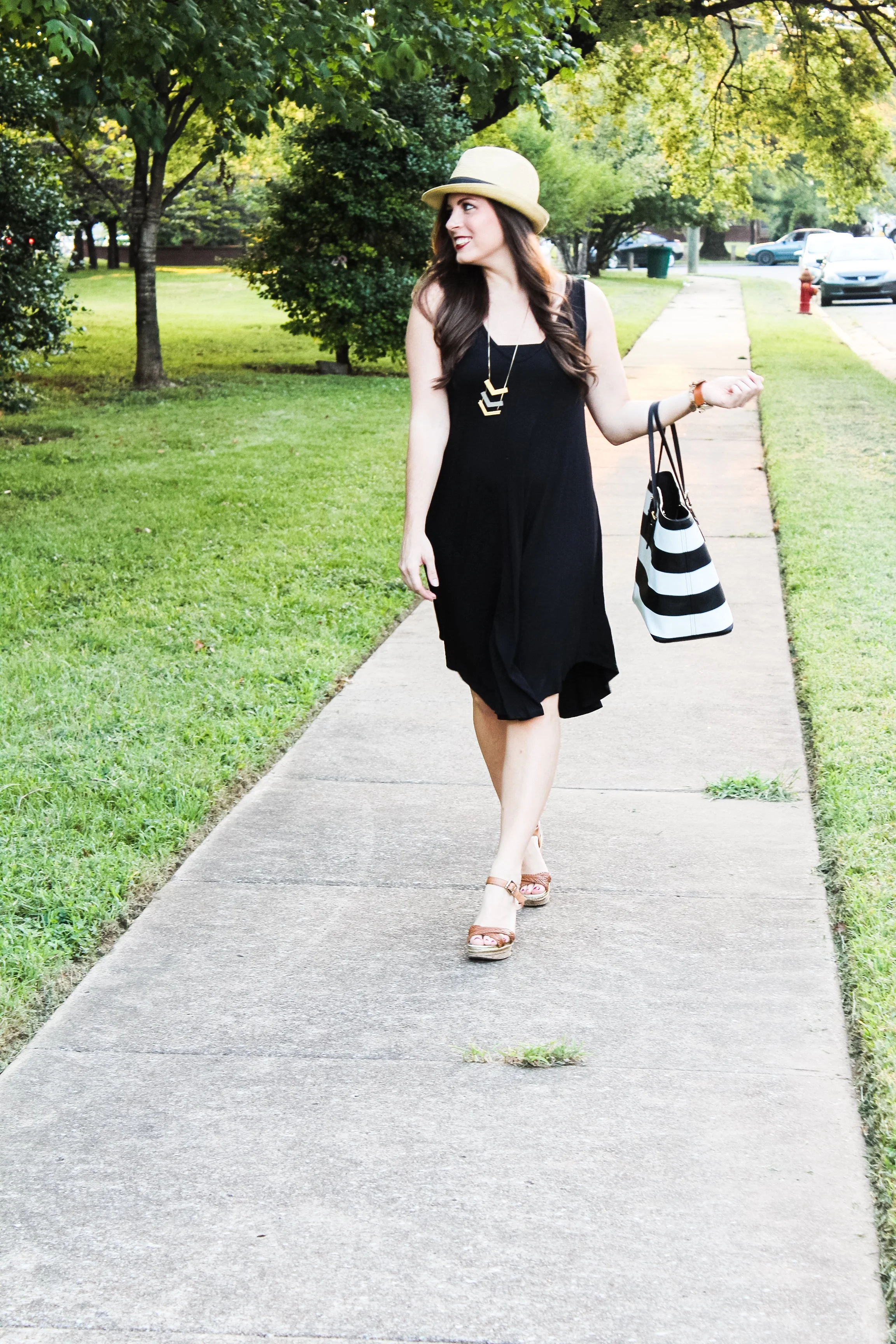 Photo: Ashley WilsoN Dress: Everest & Co. Necklace: Madewell (similar) Hat: Pangaea Nashville Tote: Michael Kors