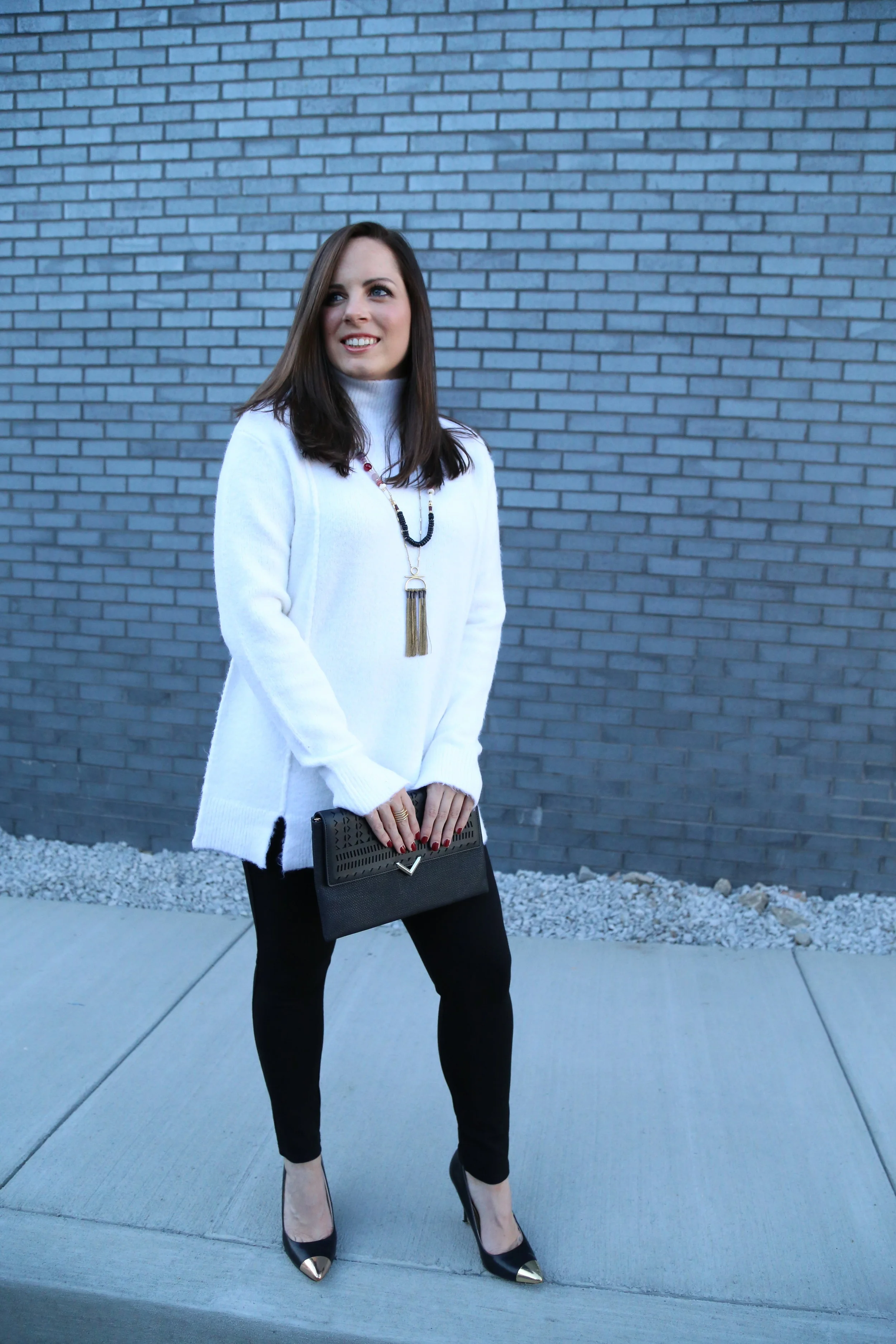 PHOTO: JESSICA VALIYI Classic Turtleneck Sweater: e.Allen Boutique Accessories by Stella & Dot Genevieve Tassel Necklace City Slim Clutch Maylee Ring