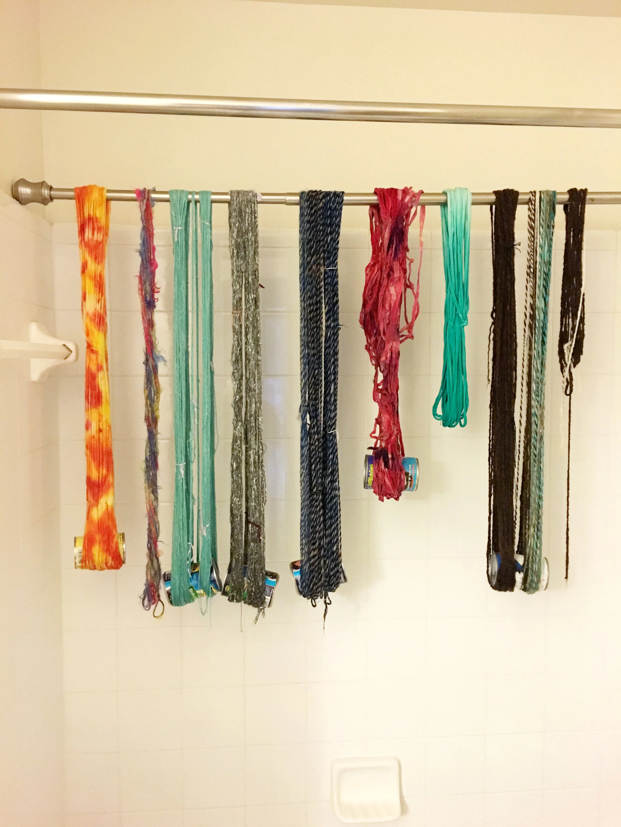 While waiting for yarn to soak up the dye, I decided to set my yarn that I had spun and let them all dry together.